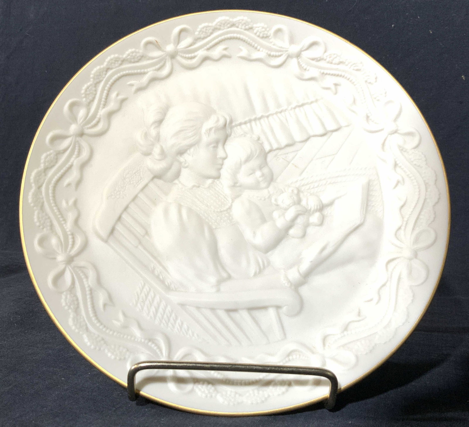 LENOX BEDTIME STORY Plate: LENOX BEDTIME STORY Plate. Dimensional depiction of a woman and child reading a story together. Underside reads The Children's Hour Bedtime Story, Lenox Made in USA, issued 1993. Porcelain, luxury por