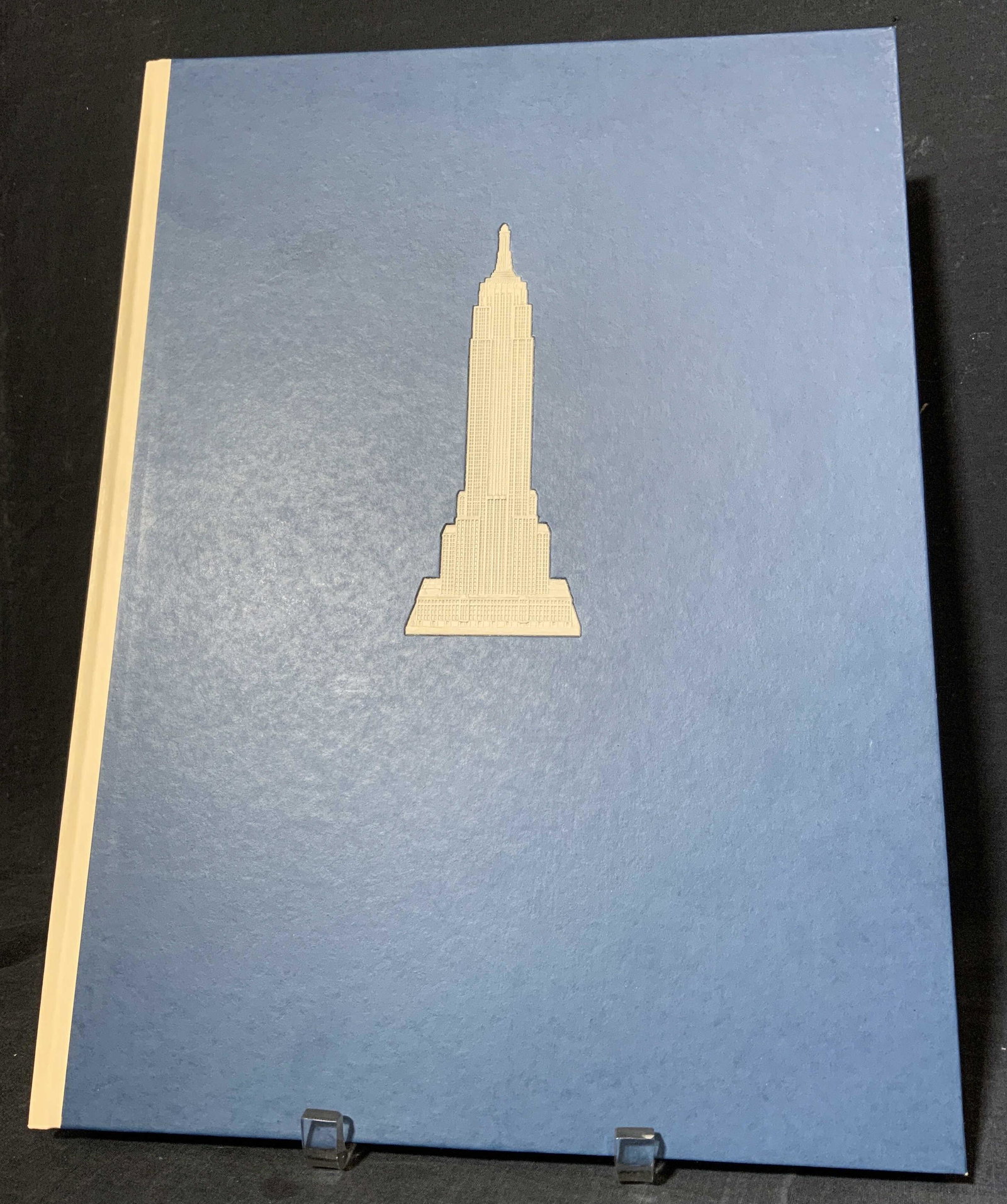 EMPIRE STATE Art Book, by WILLIAM EDWIN RUDGE: EMPIRE STATE, A PICTORIAL RECORD OF ITS CONSTRUCTION. Outlines the construction of the Empire State Building, illustrations accompanying text outline the stages of its construction. Includes a cardboa