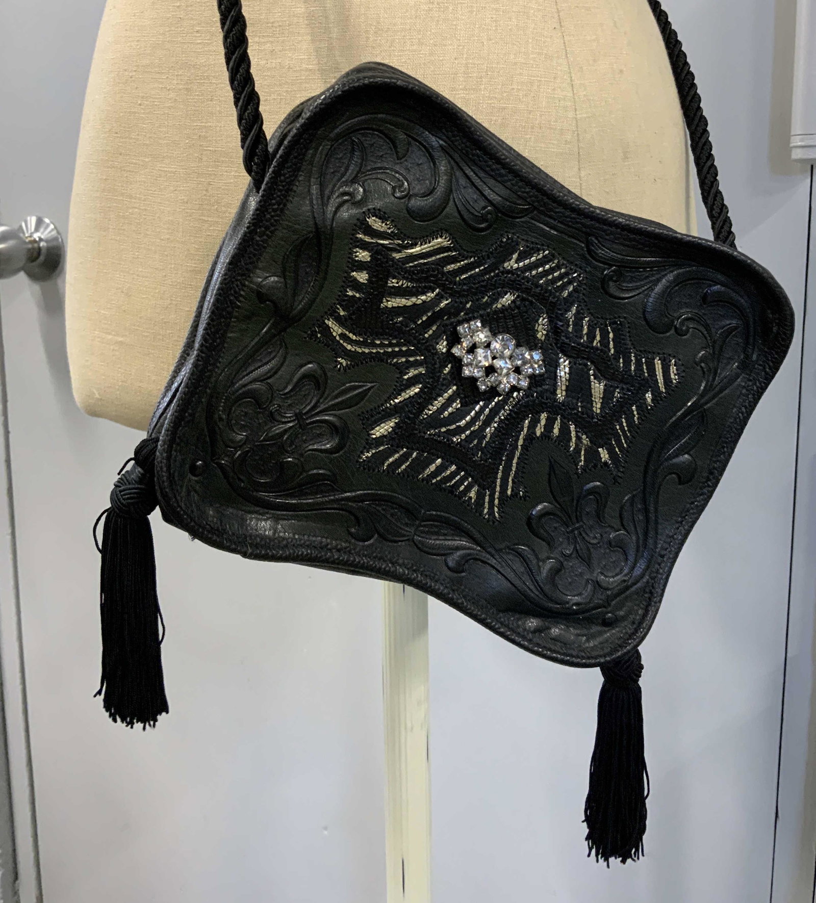 CARLOS FALCHI Faux Black Leather Womans Satchel: CARLOS FALCHI Faux Black Leather Womans Satchel, tag reads CARLOS FALCHI MADE IN USA, measures 6 x 8 inches, has a shoulder drop of 33 1/2 inches, can be tied to fit wearers ideal size. ladies fashion