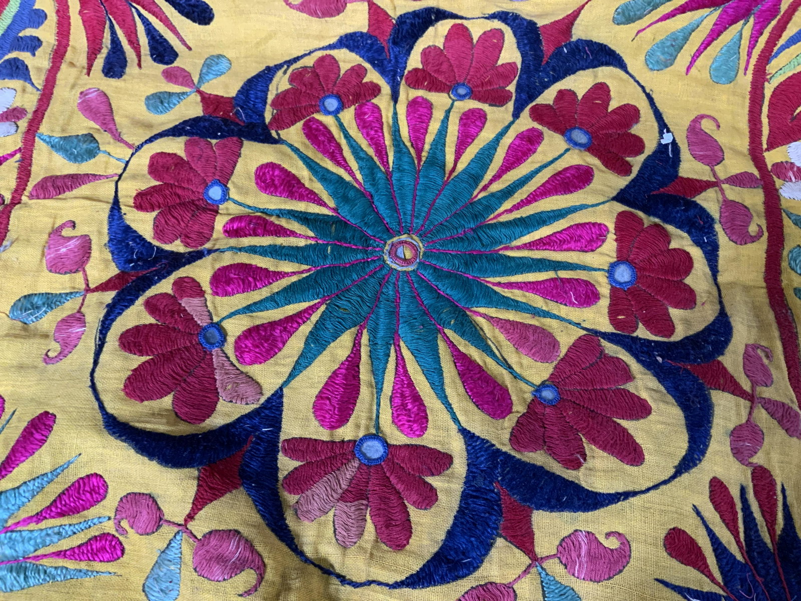 Handmade Vintage Tapestry: Handmade vintage tapestry. Underside lined with linen. Vibrant multi toned floral embroidery. Wear is consistent with age and use. Measures approx 29 x 29 inches. Tapestry, wall decor, home decor, fol