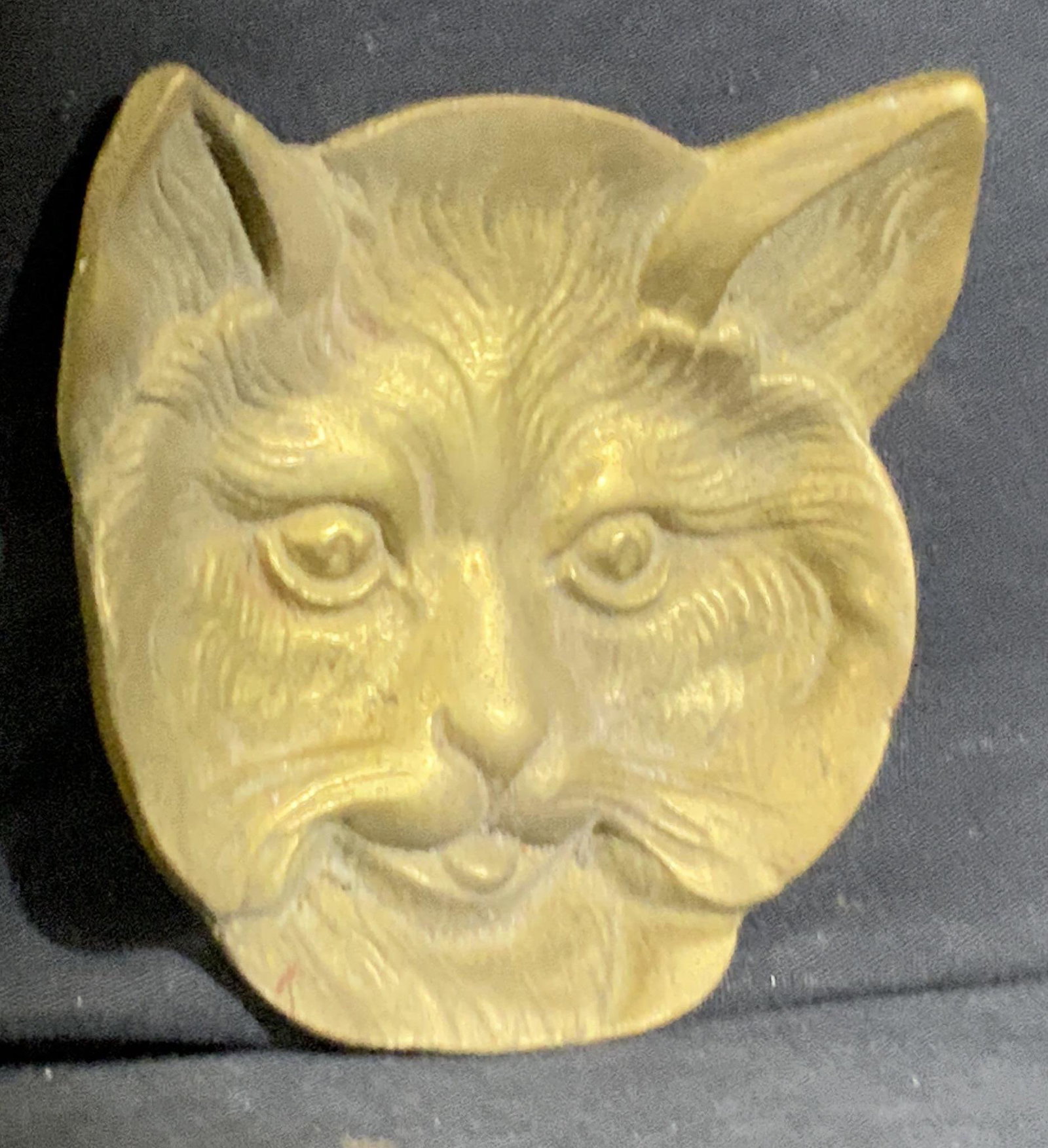 Small Brass Cat Motif Ashtray: Small Brass Cat Motif Ashtray, possibly brass, measures 3 1/2 w x 3 3/4 h inches, Wear consistent with age and use. Property of Central Park West Manhattan New York Estate. Dresser tray, decorative dr