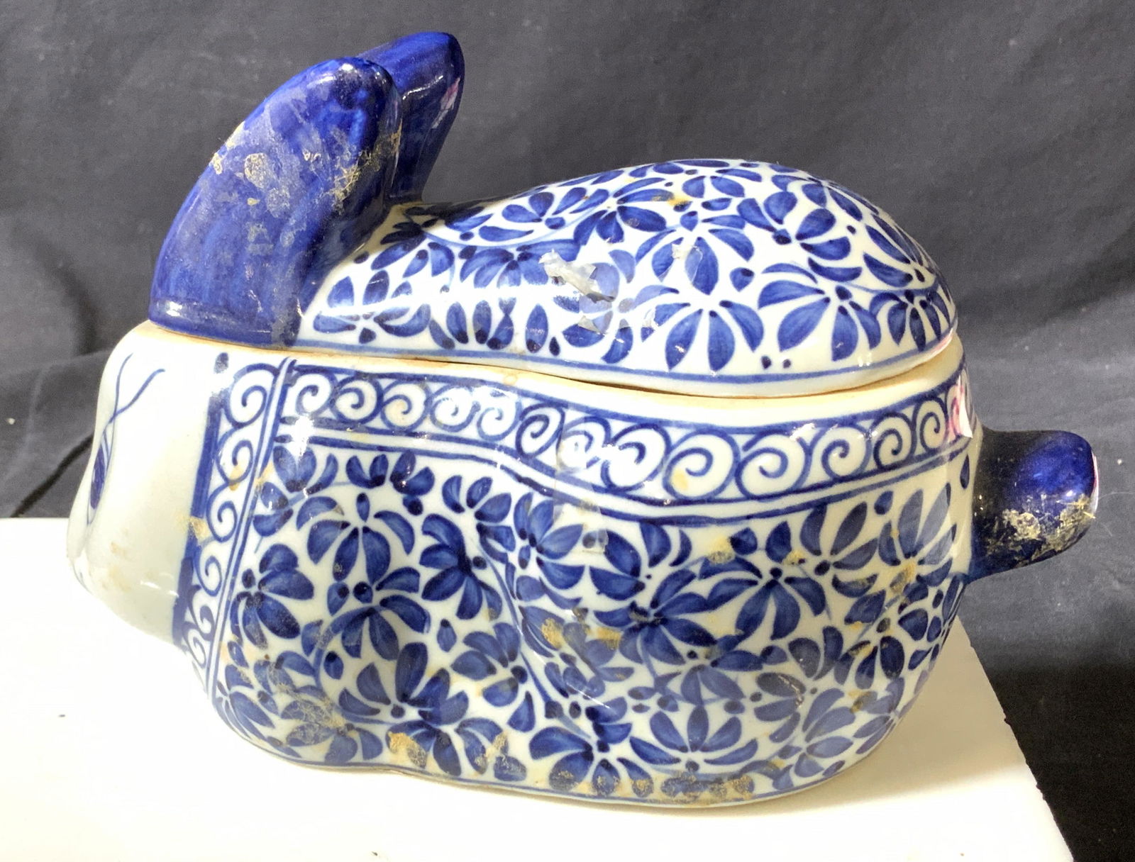 Asian Porcelain Rabbit Jar with lid: Blue and white hand painted rabbit, jar with lid. No marks . Repair to porcelain on underside. Thunder and clouds Leiwen detail , flowers and scrolls. Measures 8 x 4 in. , Ht 4.5 in Trinket Jar, Porce