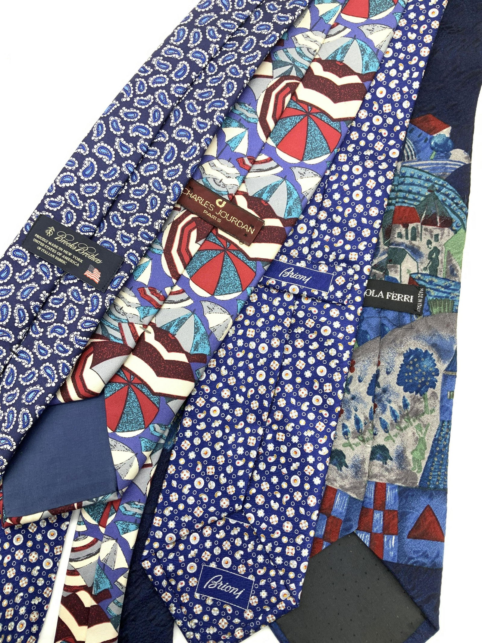 Lot 4 Mens Silk Ties,Brooks Brothers,Brioni more: All silk mens shirt ties, some more formal than others. Brands include Brooks Brothers, Brioni, Nicola Ferri, & Charles Jordan. Blue and White Paisley, Beach umbrella Pattern, folk art farm, Reticulat