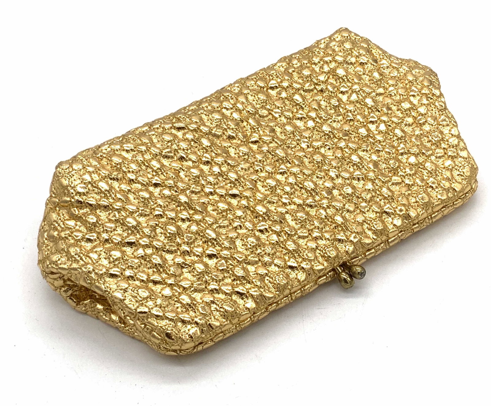 SAKS FIFTH AVE Gold Tone Metallic Fabric Clutch: A gold tone metal, fabric clutch with a soft hand lined interior. Interior tag reads Saks Fifth Avenue. Bejeweled snap closure. Measures approx 5.5L x 9.75W in. Portable Mirror contained in interior, 