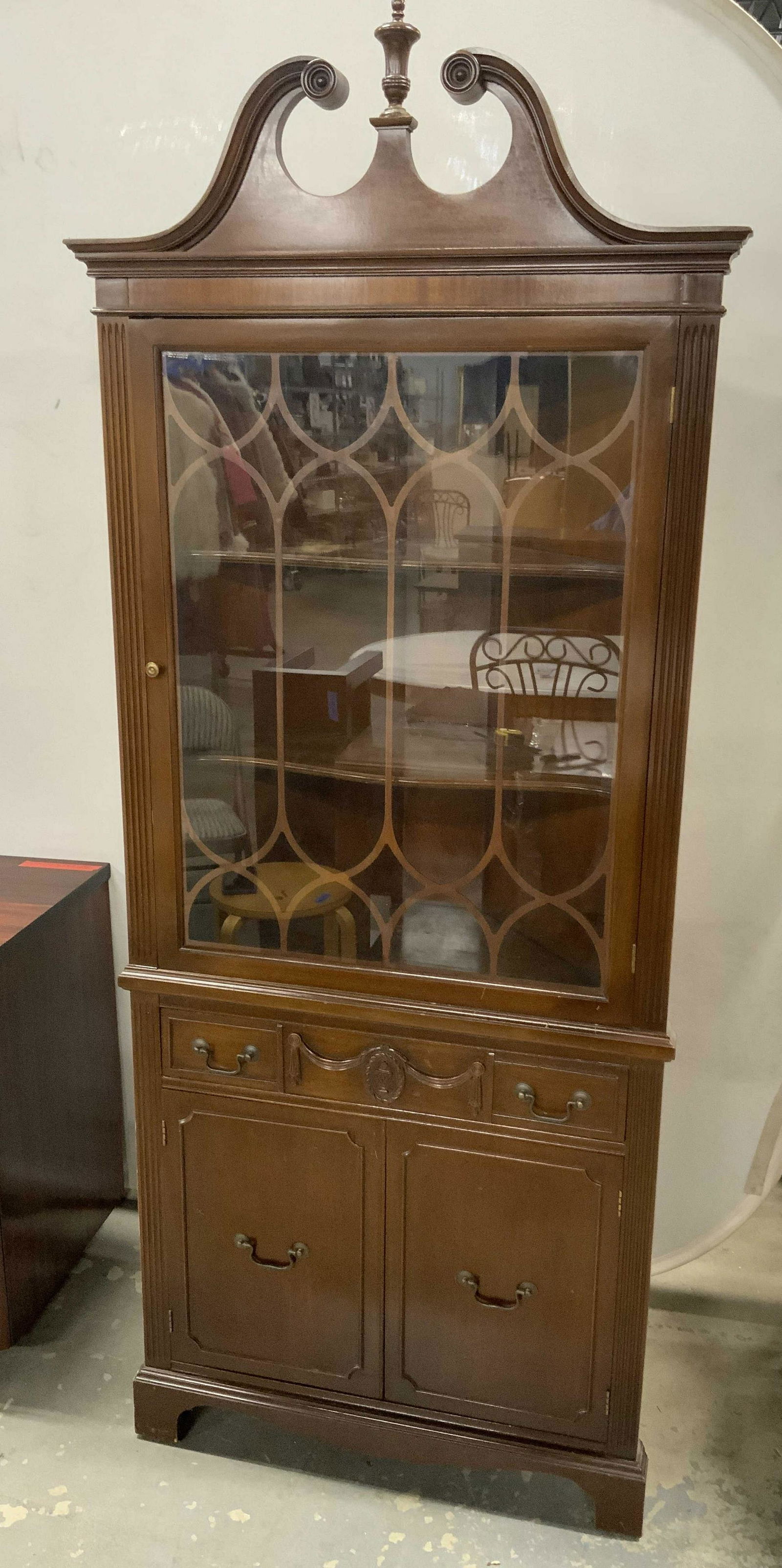 Vintage THOMASVILLE CHAIR CO. Corner Cabinet: Vintage wooden cabinet. Label on back reads as From THOMASVILLE Chair company, from THOMASVILLE N.C. Houses one drawer, 1 upper cabinet with windowed door, and 1 lower cabinet. Lower cabinet houses 1