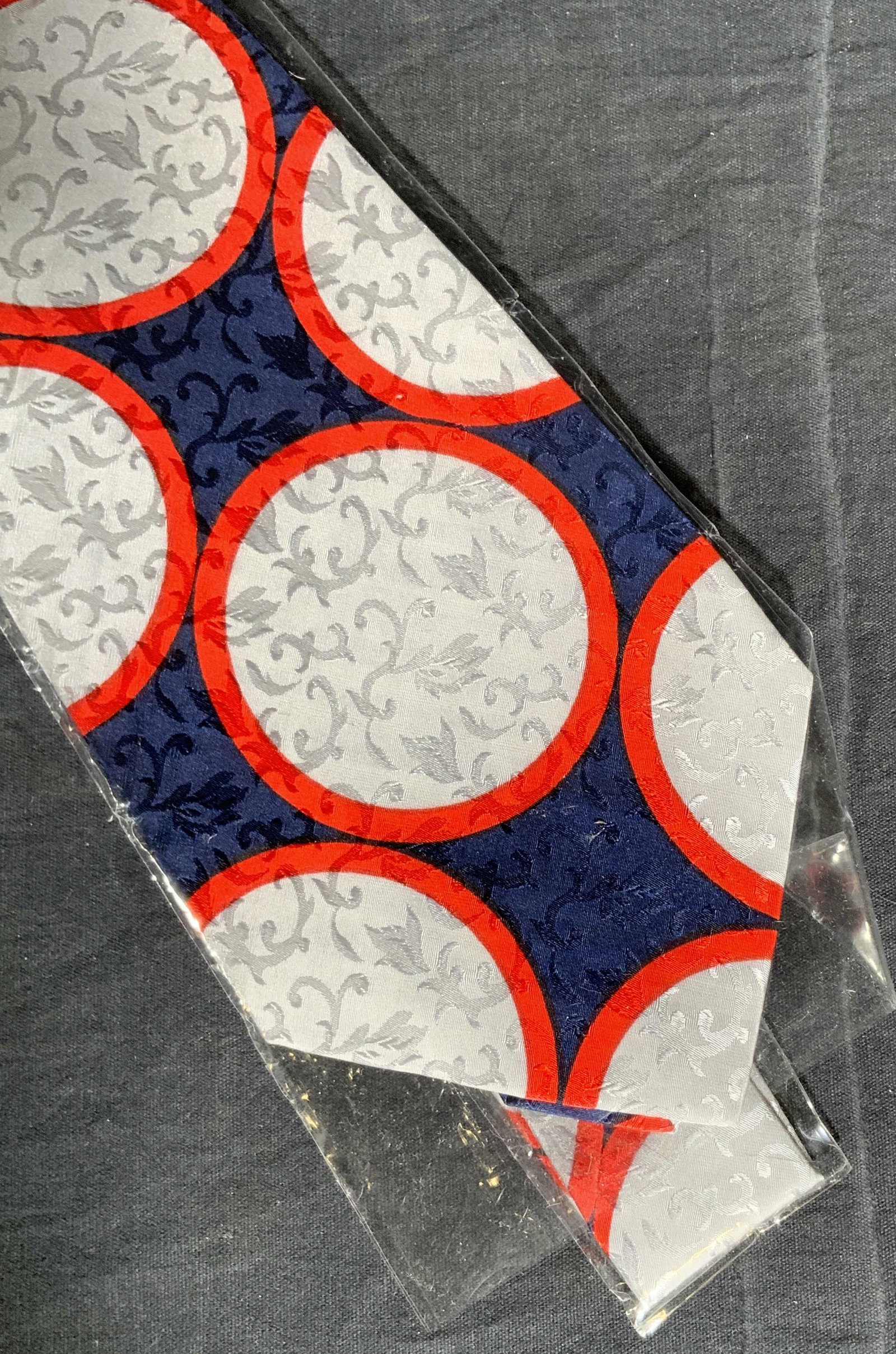 RAPHAEL ROMA Patterned Silk Tie: RAPHAEL ROMA Patterned Silk Tie, tag reads RAPHAEL ROMA, in original packaging, measures approx 56 inches long x 5 inches wide. Ties, mens ties, silk ties, decorative ties, illustrated ties, silk wear