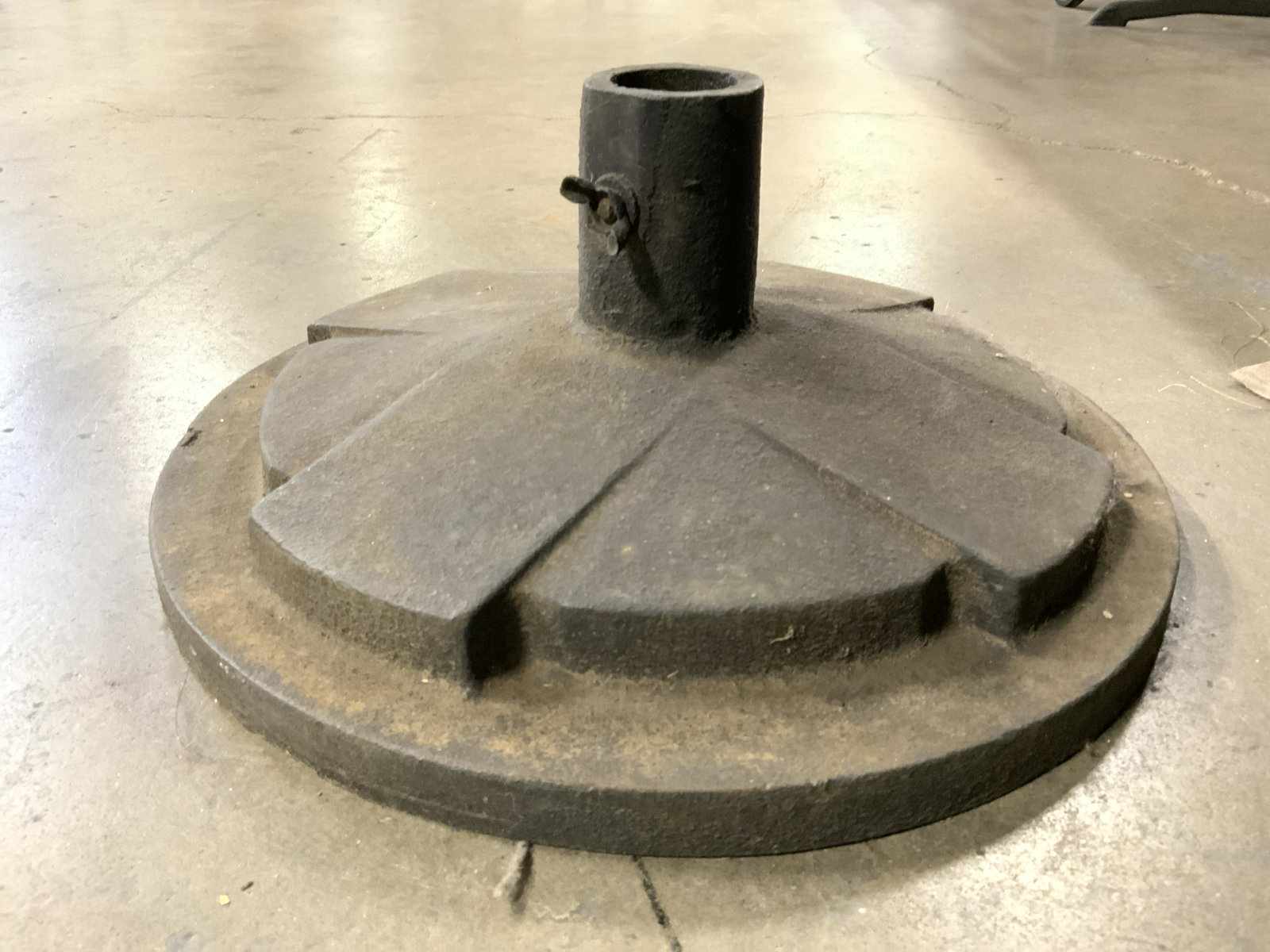 Vintage Iron Metal Umbrella Holder: Umbrella holder is vintage. Piece appears to be iron. Umbrella holder has circular base. Piece measures approx 15 inches wide 6 inches tall. Umbrella holder, umbrella base, iron umbrella base, metal u