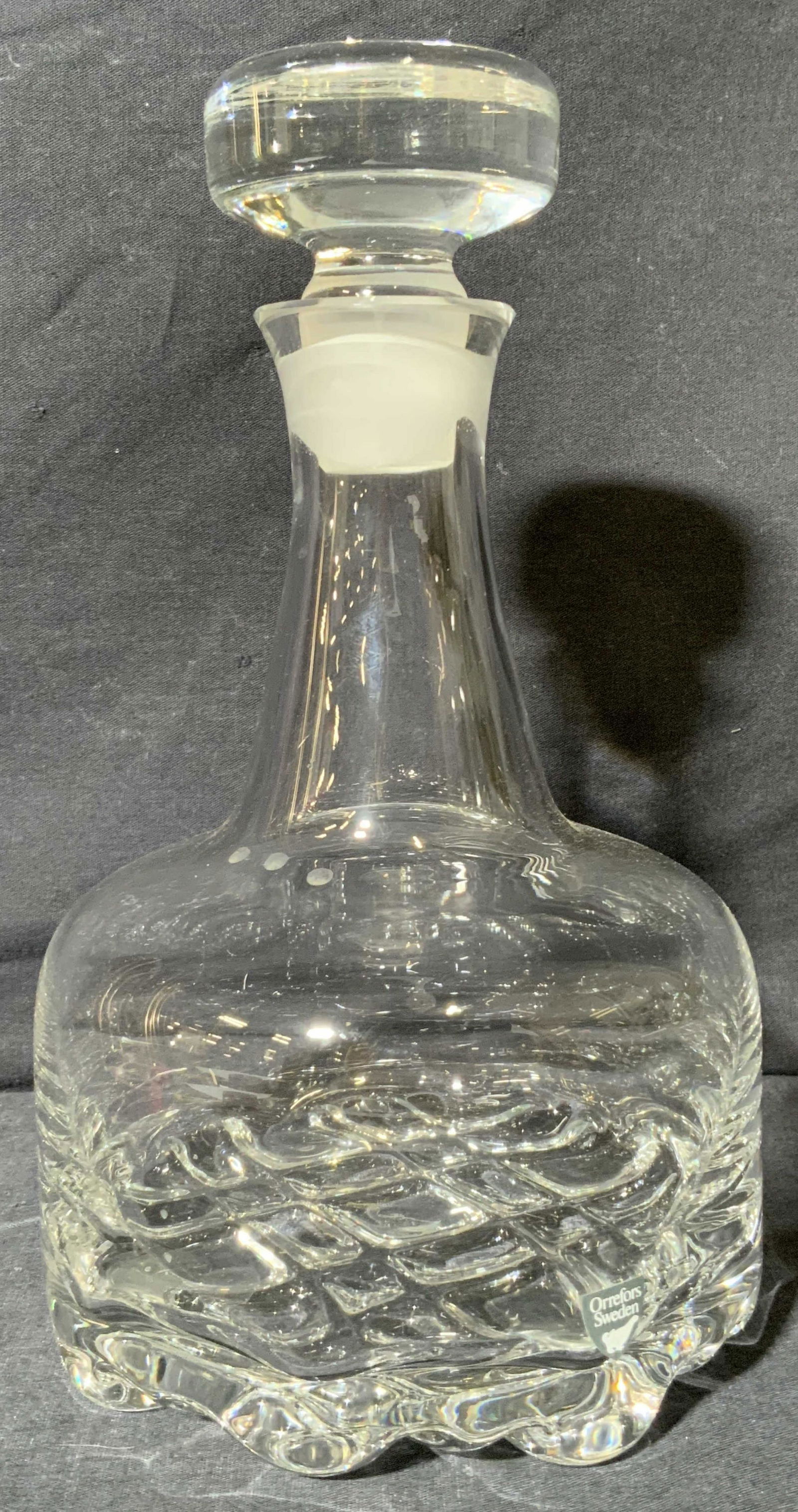 ORREFORS SWEDEN Crystal Decanter: ORREFORS SWEDEN Crystal Decanter, marking to base of body reads ORREFORS SWEDEN, inscription to underside illegible, subject a clear crystal decanter, measures 9 1/2 inches tall, surface wear to piece