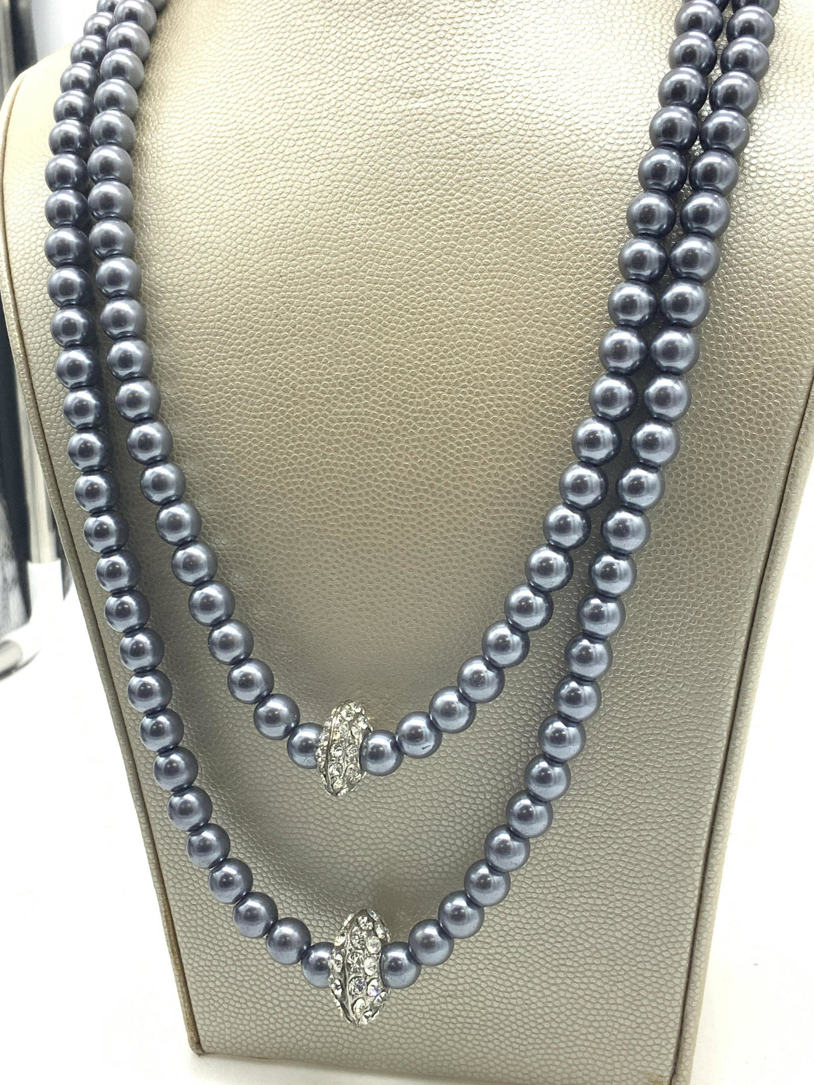 Tahitian Pearl Style Double Strand Necklace: Double strand necklace with center crystal disc. Lobster clasp, measures 18 in. , one strand longer than the other. Property of Manhattan, New York Estate of D. Winston, matchmaker to the stars, NYC S