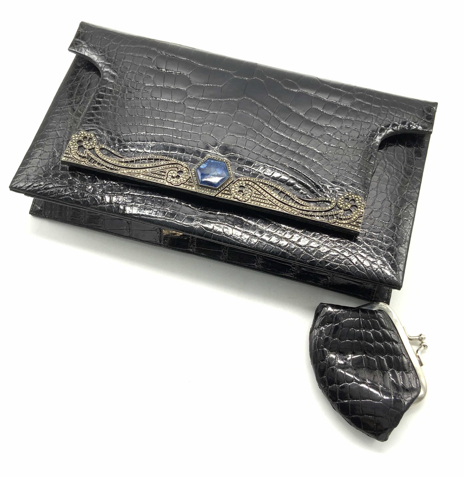 Vintage LA JEUNESSE Black Croc Marcasite Purse: A vintage French LA JEUNESSE structured black Croc purse decorated with a blue hued stone cabochon and marcasites. Silver tone metal hardware. Snap closure. Interior is a black hue with 2 open side po