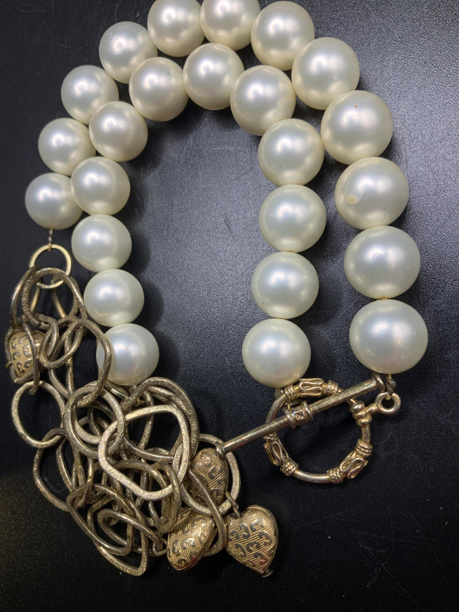 Toggle Clasp Costume Pearl and Heart Choker: 14 in. Choker necklace, upper have strung with costume pearls , lower have gold tone triple strand layered links with heart charms. Property of Manhattan, New York Estate of D. Winston, matchmaker to 
