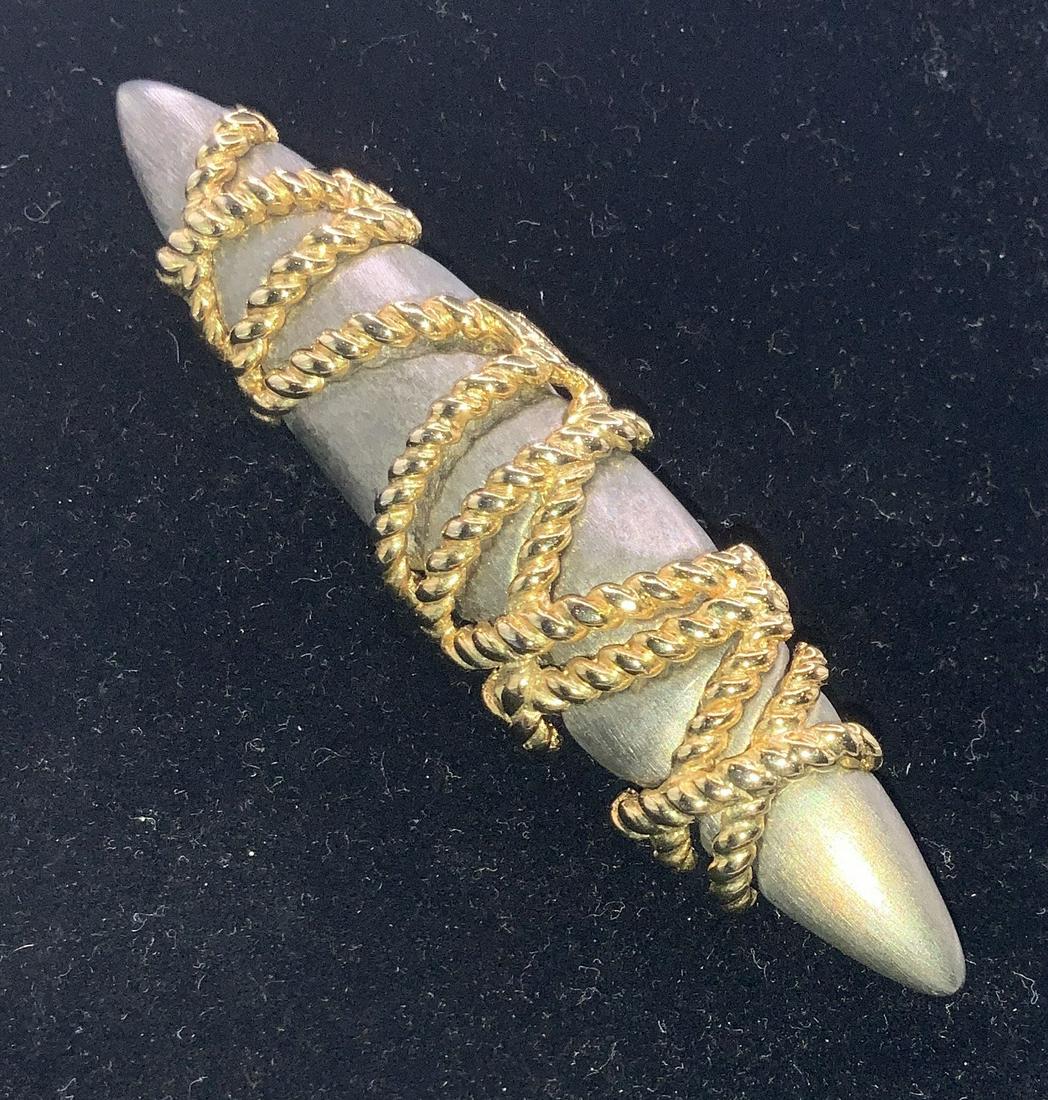 Sculptural Minimalist Two Tone Brooch: Vintage Brooch of brushed silver tone metal wrapped in gold tone rope design. 3.5:8;. Long. Property of Manhattan, New York Estate of D. Winston, matchmaker to the stars, NYC Socialite and philanthrop