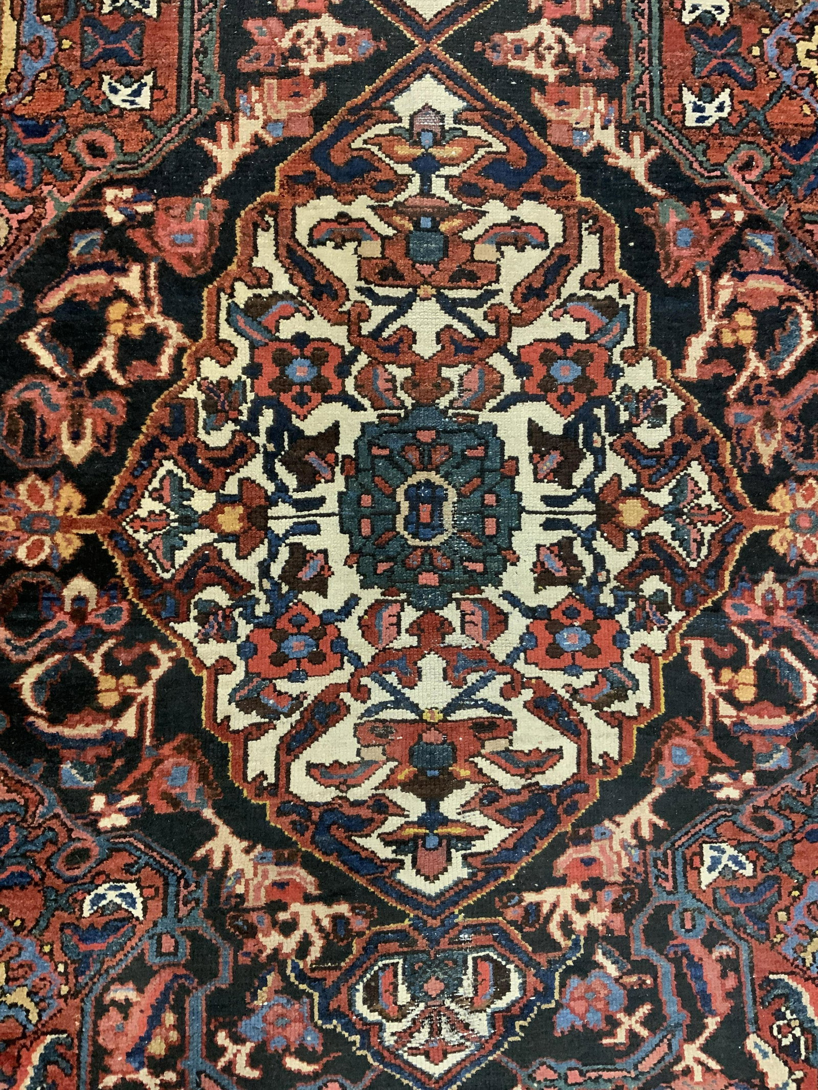 Vintage Handmade Turkish Wool Rug: Rug is handmade and wool. Piece is vintage possibly antique. Rug has intricate multi toned floral, leaf & geometric detail. Rug measures approx 160 inches long 66 inches wide. Rug, carpet, wool rug, h