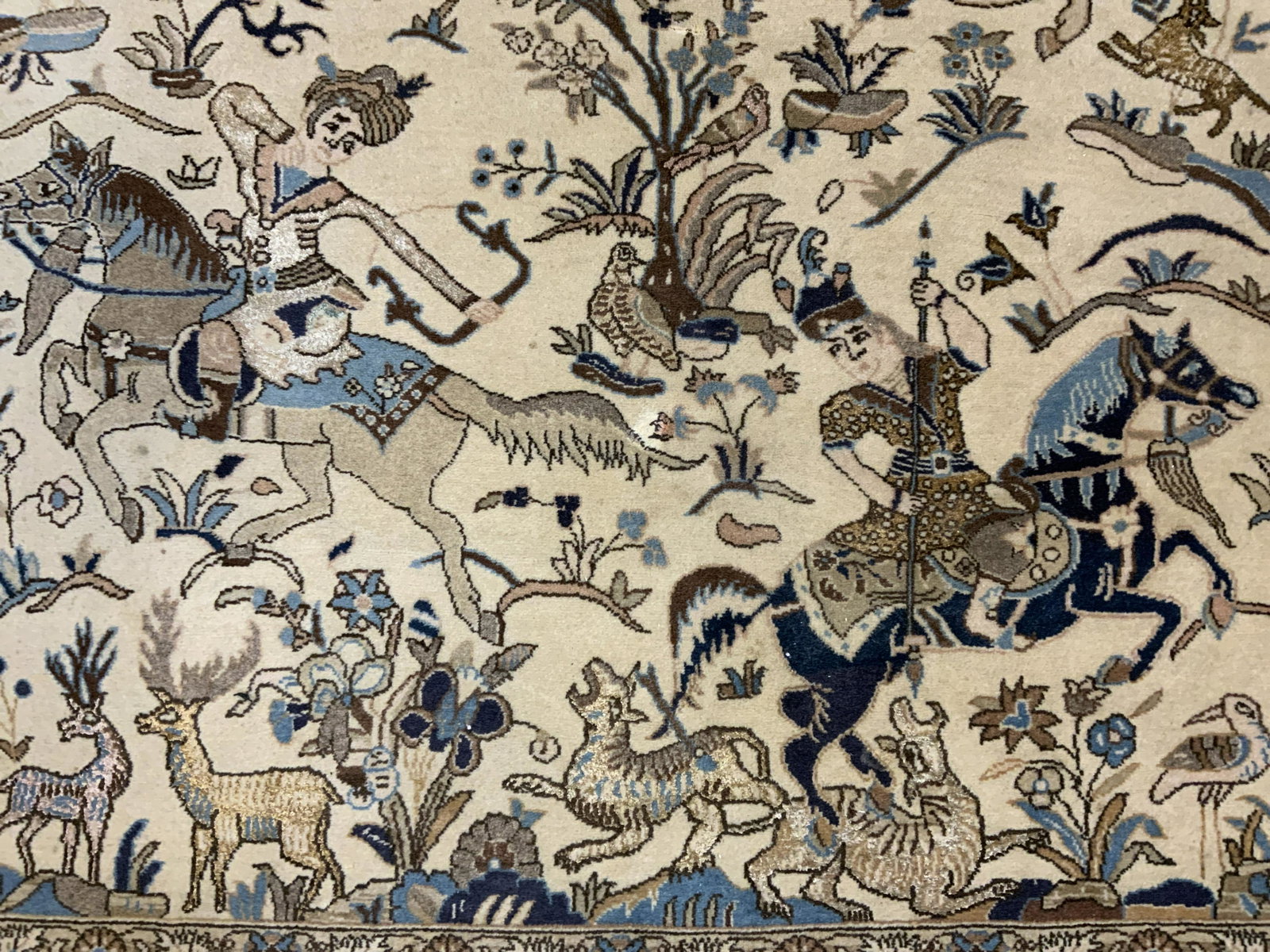 Fringed Pictorial Hunting Scene Area Rug: Pictorial area rug, appears to be vintage. Depicts several men on horseback, hunting. Ends are fringed. Wear is consistent with age and use, wear to fringes, general surface wear, needs cleaning, pull