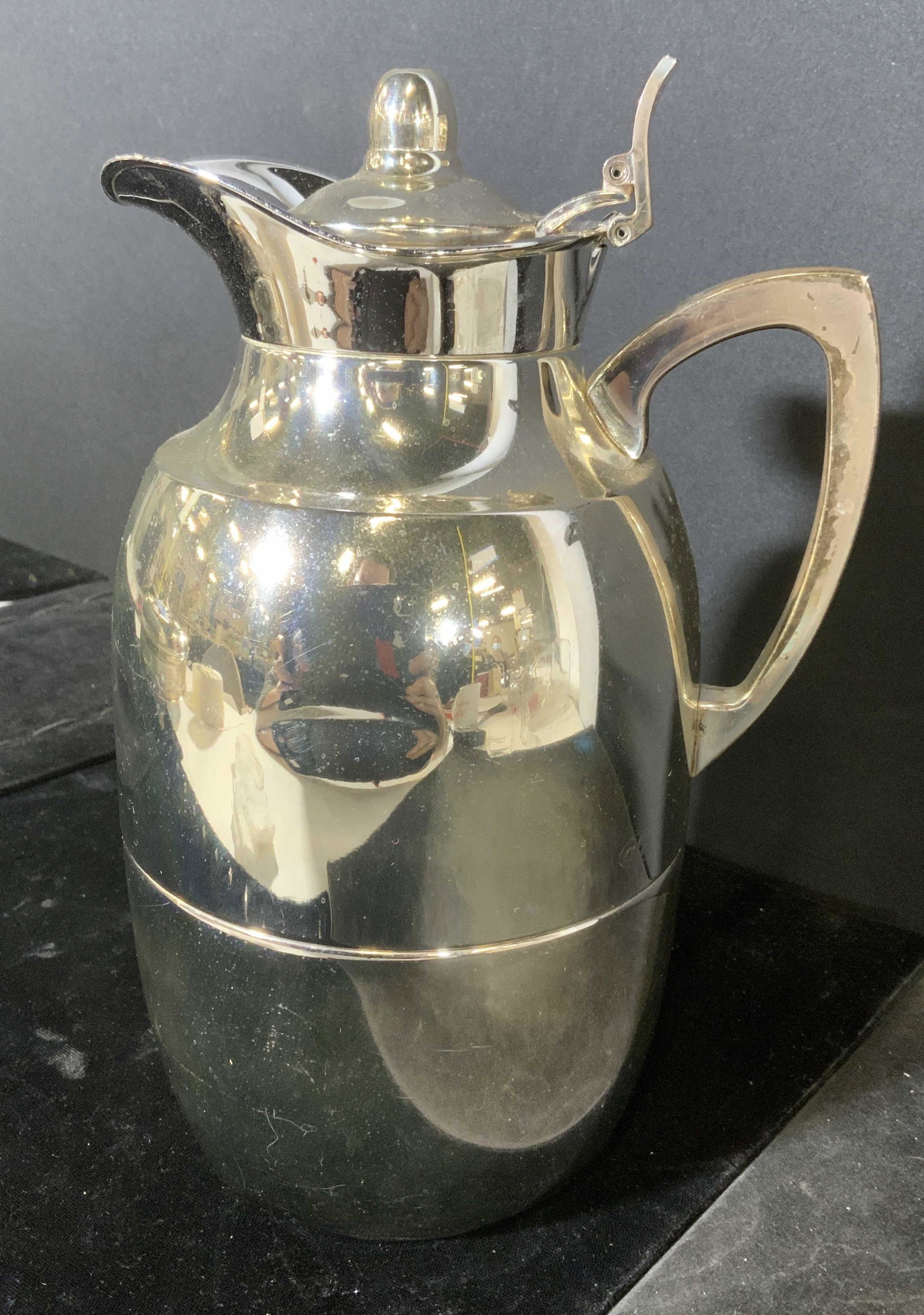 Vintage ALFI Vacuum Carafe, Germany: Chrome finish vacuum carafe. Underside reads as ALFI Western Germany. Wear is consistent with age and use, denting present. Measures approx 9.75 inches h and 6.5 inches w. Home decor, decorative acces