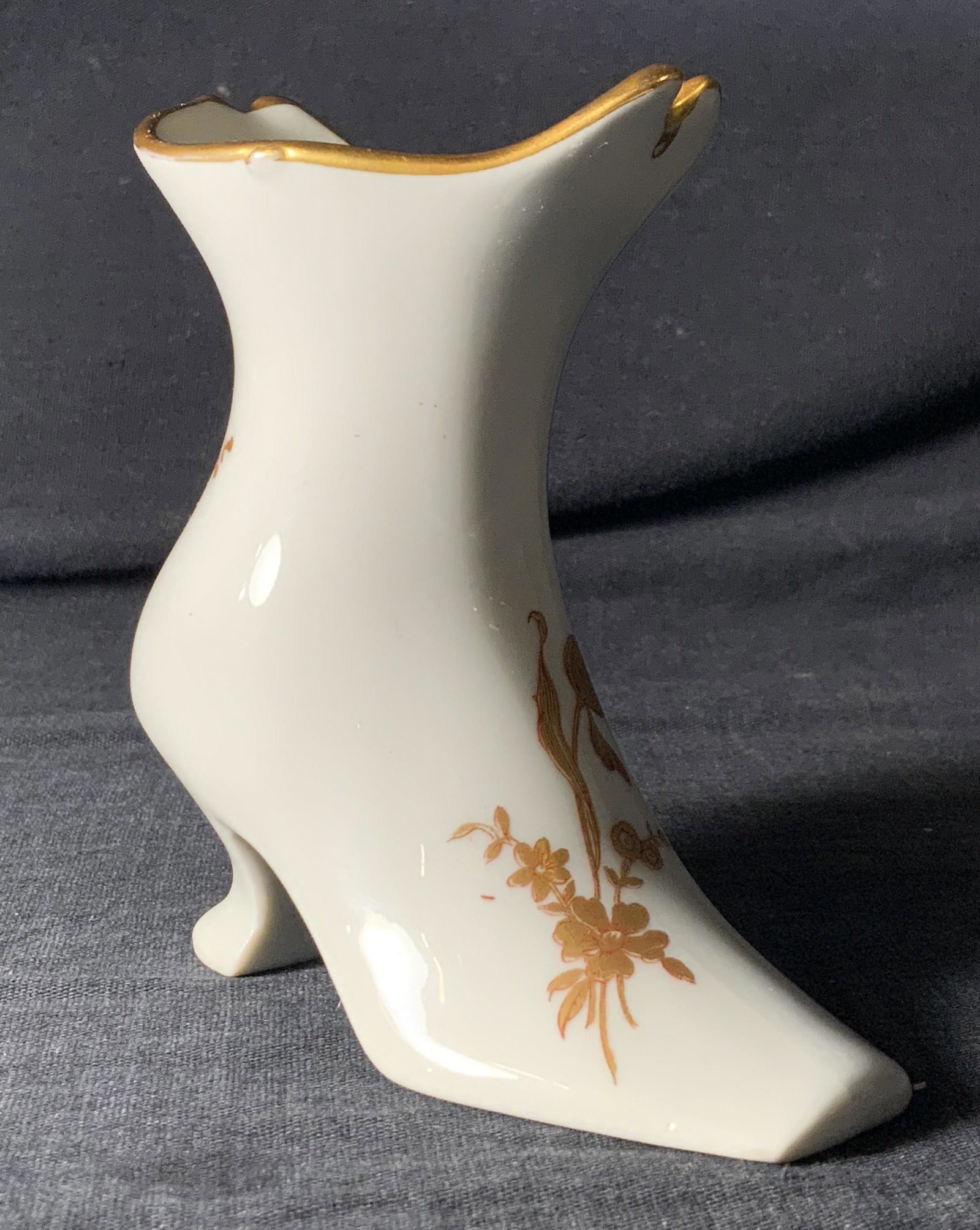 Vintage LIMOGES Floral Boot Vase: Vintage LIMOGES Floral Boot Vase, LIMOGES stamp to underside, measures 4 inches long x 2 inches wide x 4 inches tall. Property of Manhattan, NY estate. Limoges, Limoges porcelain, Limoges porcelain de