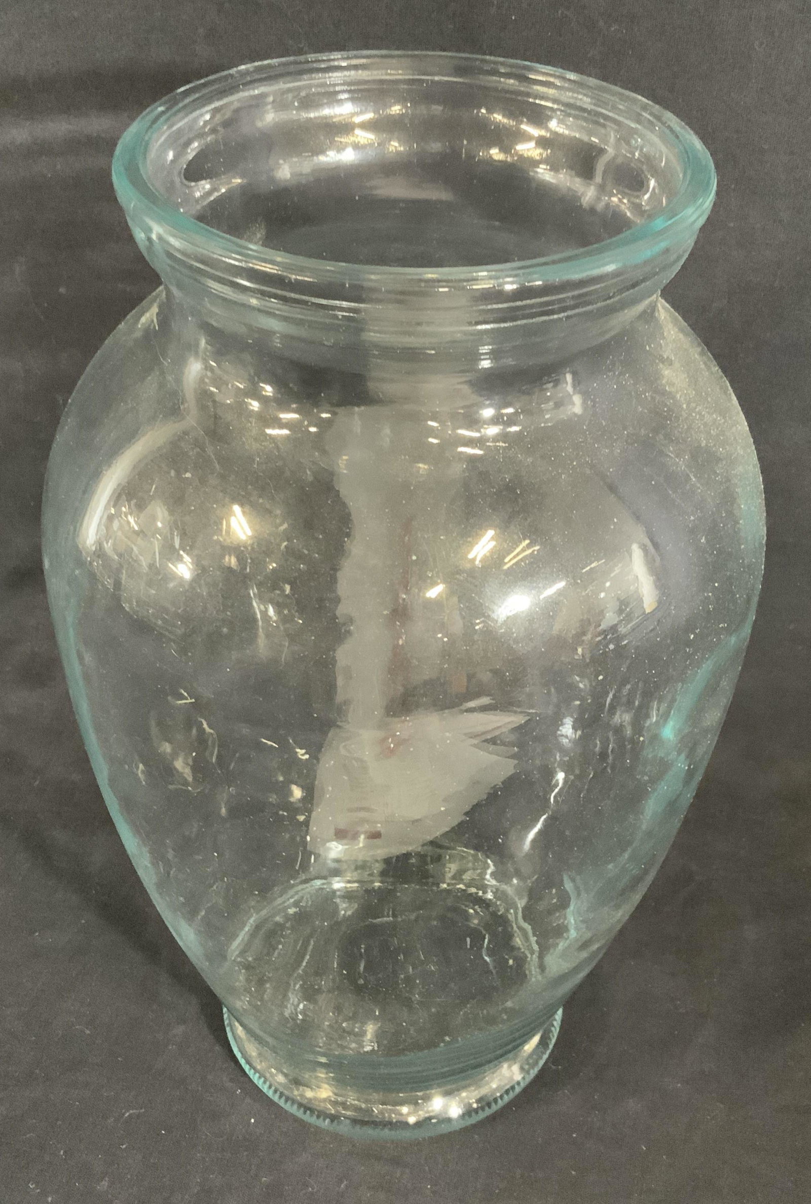 EUROPA Brody Co Glass Flower Vase: Minimalist Molded glass floral vase with hint of blue color. Embossed hallmark con verso. c.97 (1997) 12 TM Europa Brody Company. 11 in. Ht, 7 in wide. Glass flower vase, glass tabletop vase, Molded g