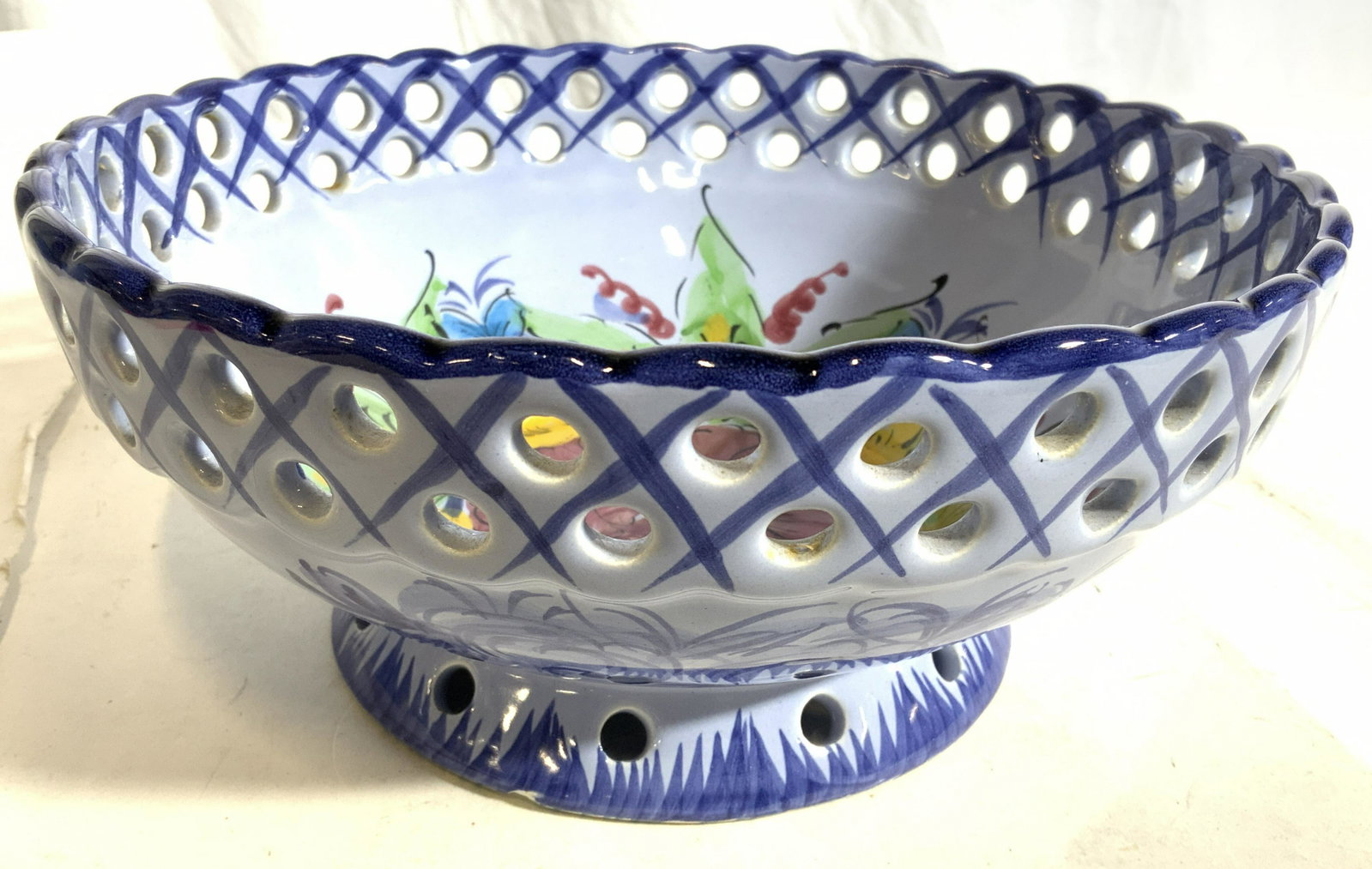 VESTAL Hand Painted Porcelain Bowl: Underside of bowl is marked VESTAL MADE IN PORTUGAL HAND PAINTED 885. Piece has pierced detail near rim & at base. Piece appears to have floral & leaf detail. Piece measures approx 9 inches wide 4 inc