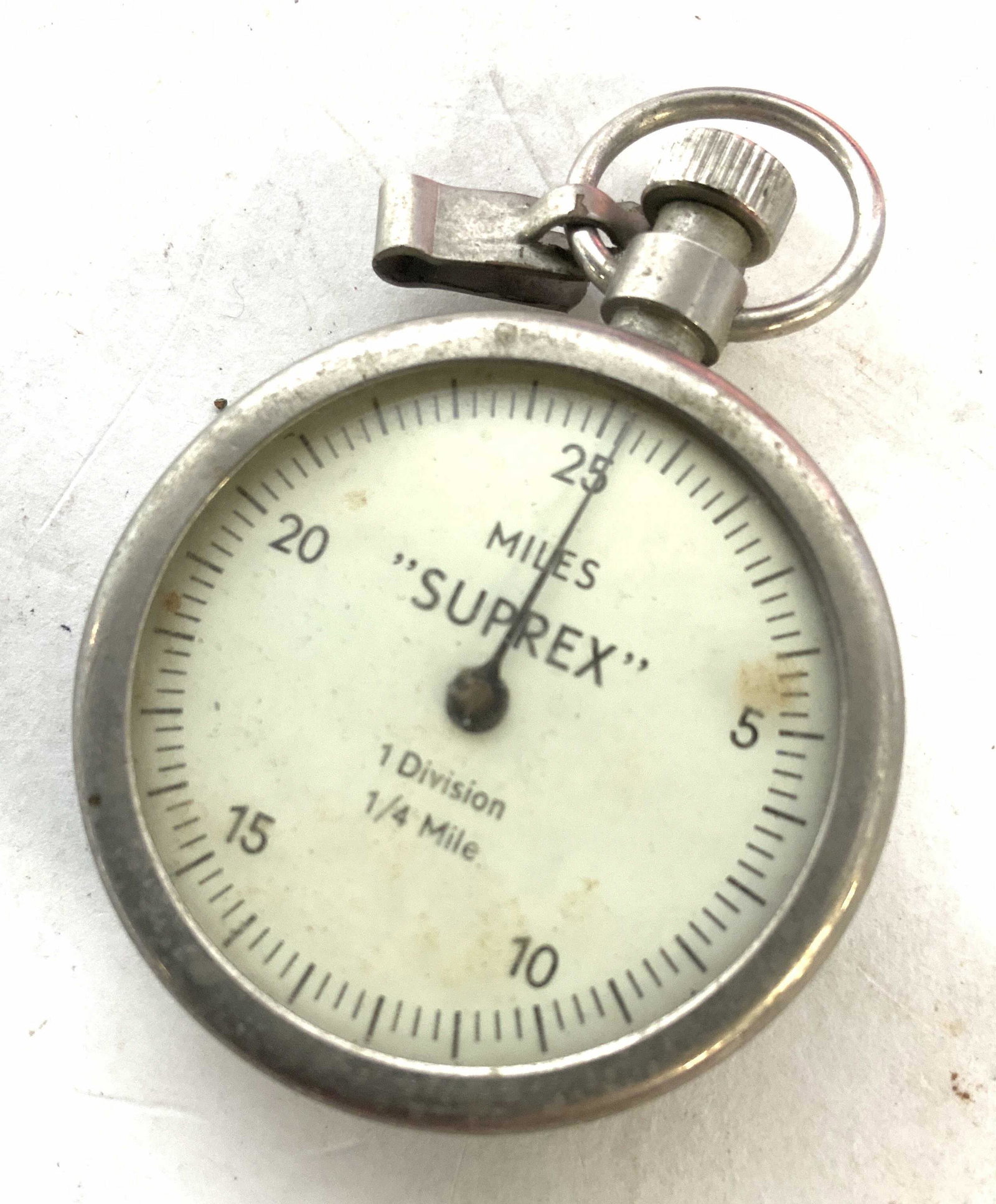 Vtg Miles Suprex FOB Pocket Pedometer: Vintage Suprex Pedometer, 25 Miles Register, 1/4 Mile Per Division Pocket FOB. Silver tone metal. German made mechanical instrument for counting walking distances. It was made for the British market a