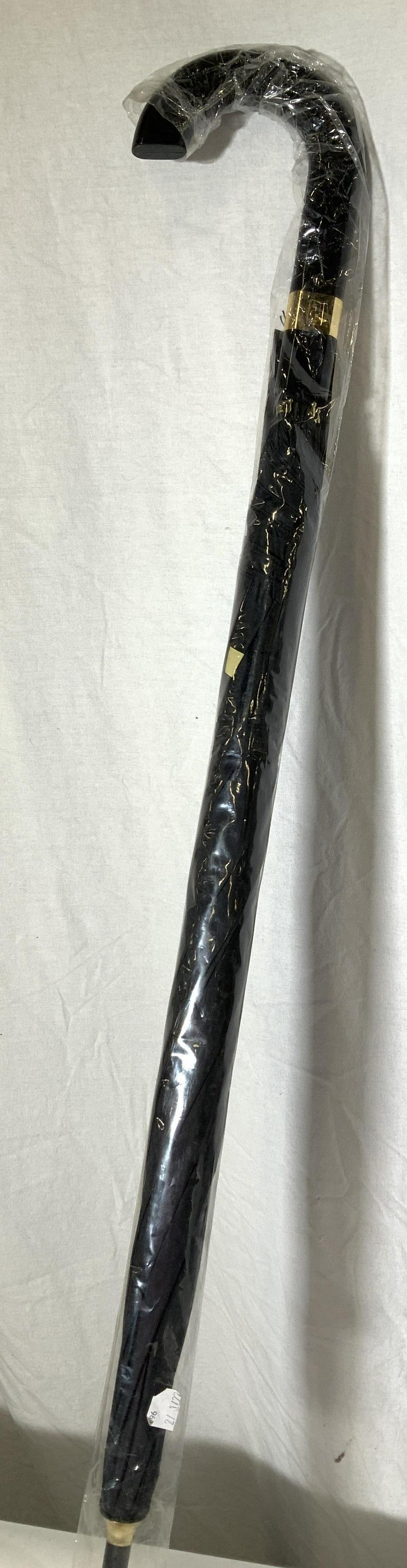 FENDI OUMO Black Umbrella, Italy NIP: J- handle BLACK Fendi Umbrella, original packaging, 35 in. Long. Gold tone accents, signed with Fendi FF logo. Property of Manhattan, NY estate Fendi Umbrella, Mens Luxury accessory, Umbrella, Fendi ,