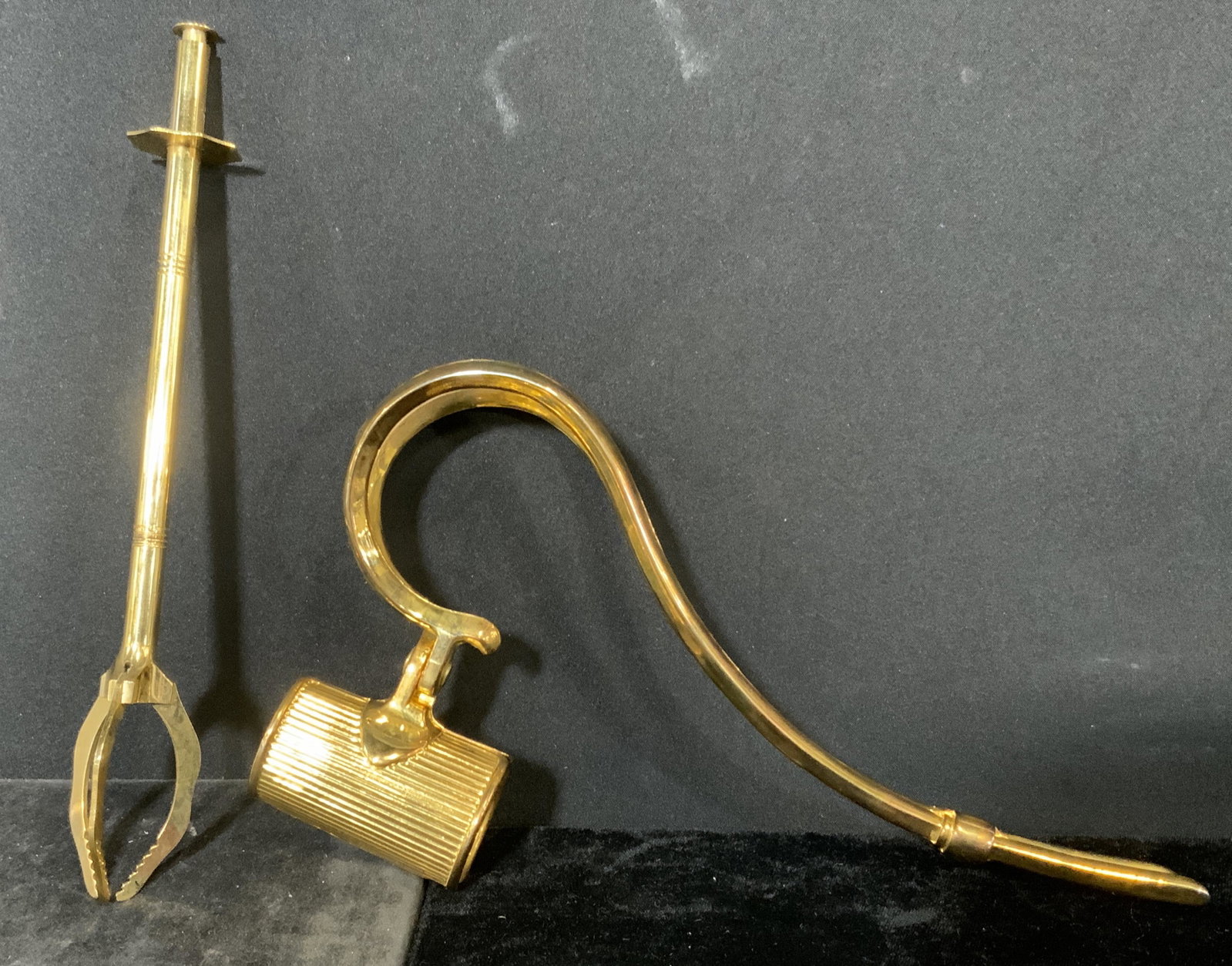 Lot 2 Gilt Serving Accessories: Includes 1 pair of tongs, and 1 wine bottle clasp. Clasp reads as Brevettato, EP Zinc. Largest measures approx 8.5 inches long and 5 inches w. Home decor, decorative accessories, decorative arts, vint