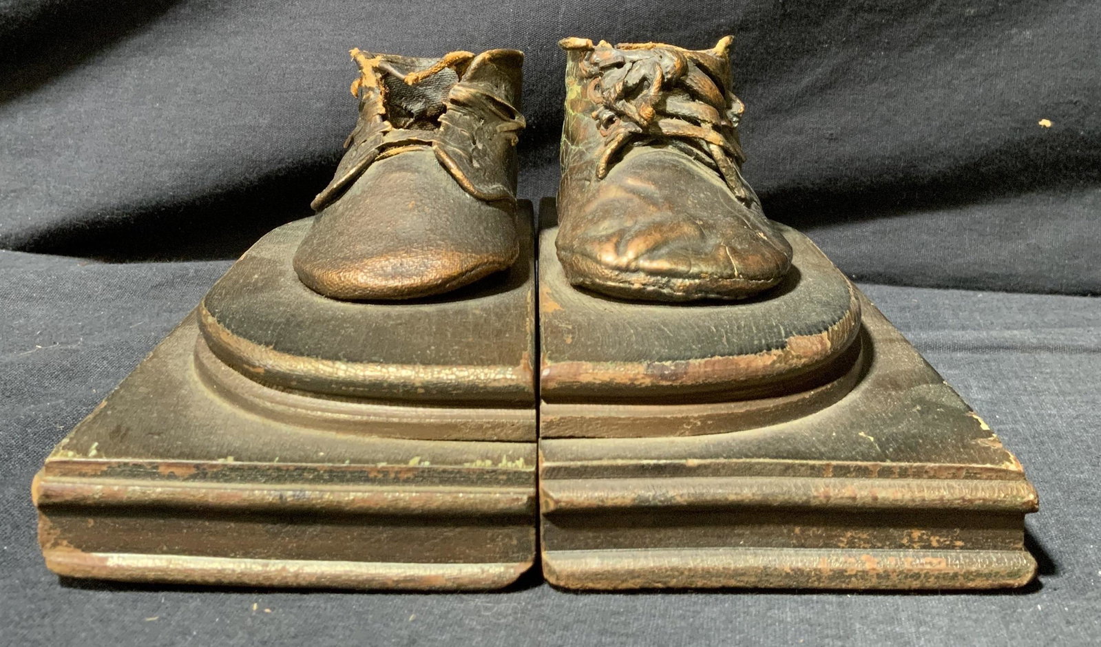 Leather Boots On Wood Base Book Ends: Leather Boots On Wood Base Book Ends, each measures 7 L x 3 w x 3 1/2 h inches, boots have visible signs of wear. Bookends, luxury bookends, decorative bookends, art, bookshelf art, home decor, shelf 