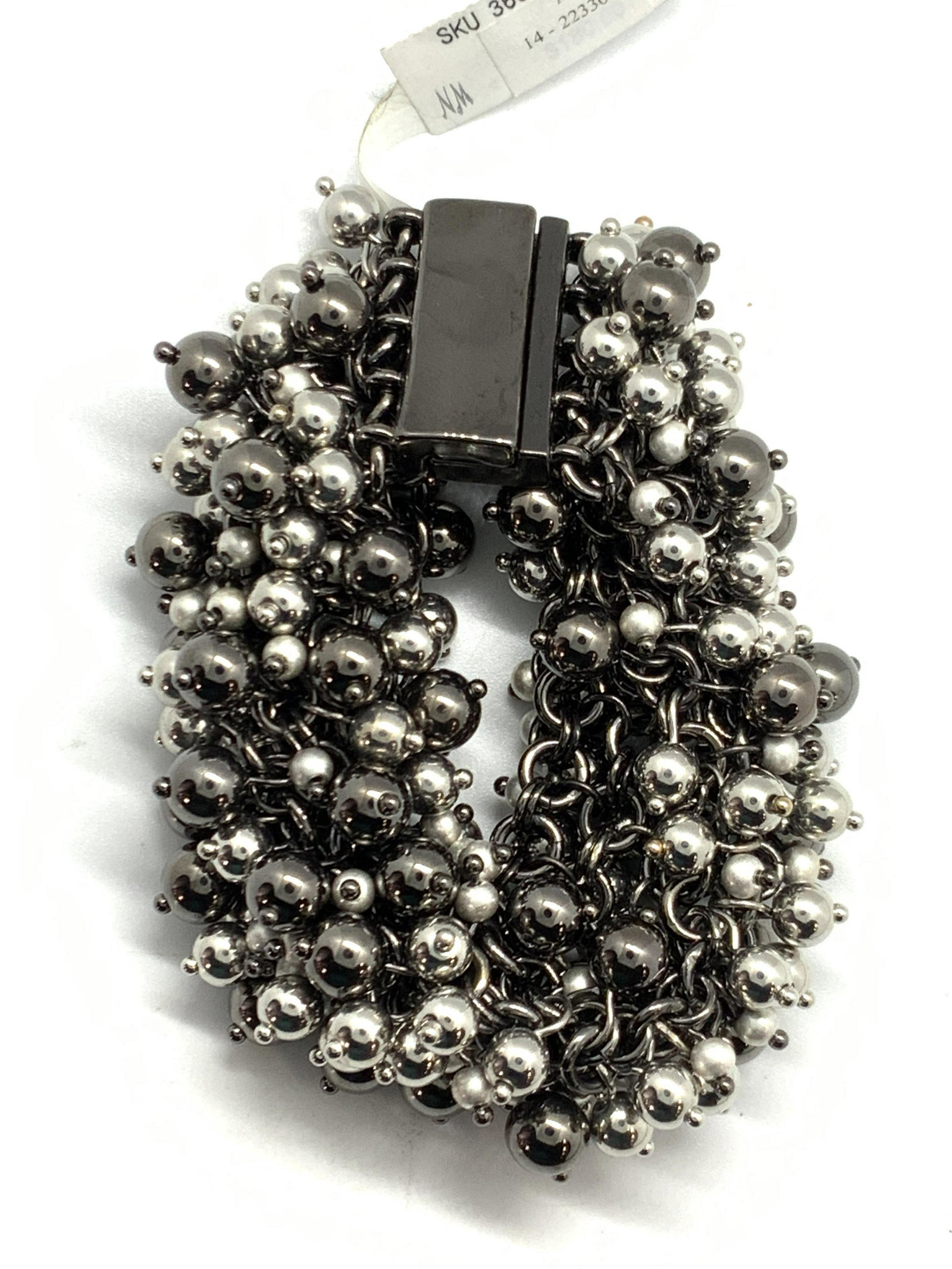 Magnetic Black Statement Bracelet: Magnetic clasp chain bracelet with black and gray beads. approximately 8 inches long. Tag is marked Neiman Marcus. Chunky jewelry, statement jewelry, Vintage Jewelry, Fashion Jewelry, Estate Jewelry, 