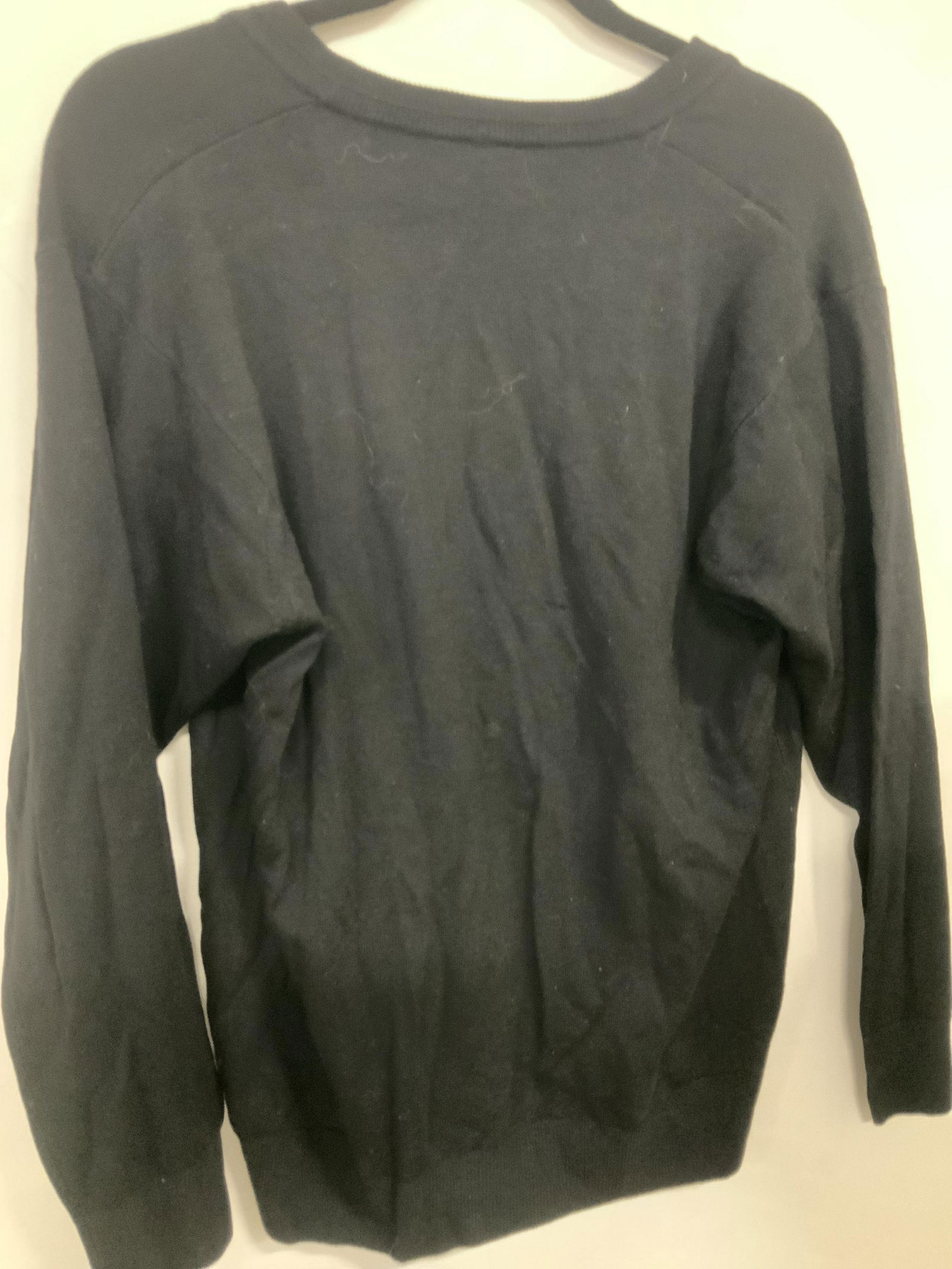 Bergdorf Goodman Wool Cardigan, Italy: Luxury Knit wool Cardigan in black, labeled Bergdorf Goodman on the Plaza- Made in Italy. Size large ladies. Button down, long V collar. Property of Manhattan, NY Estate Luxury knitwear, luxury vintag