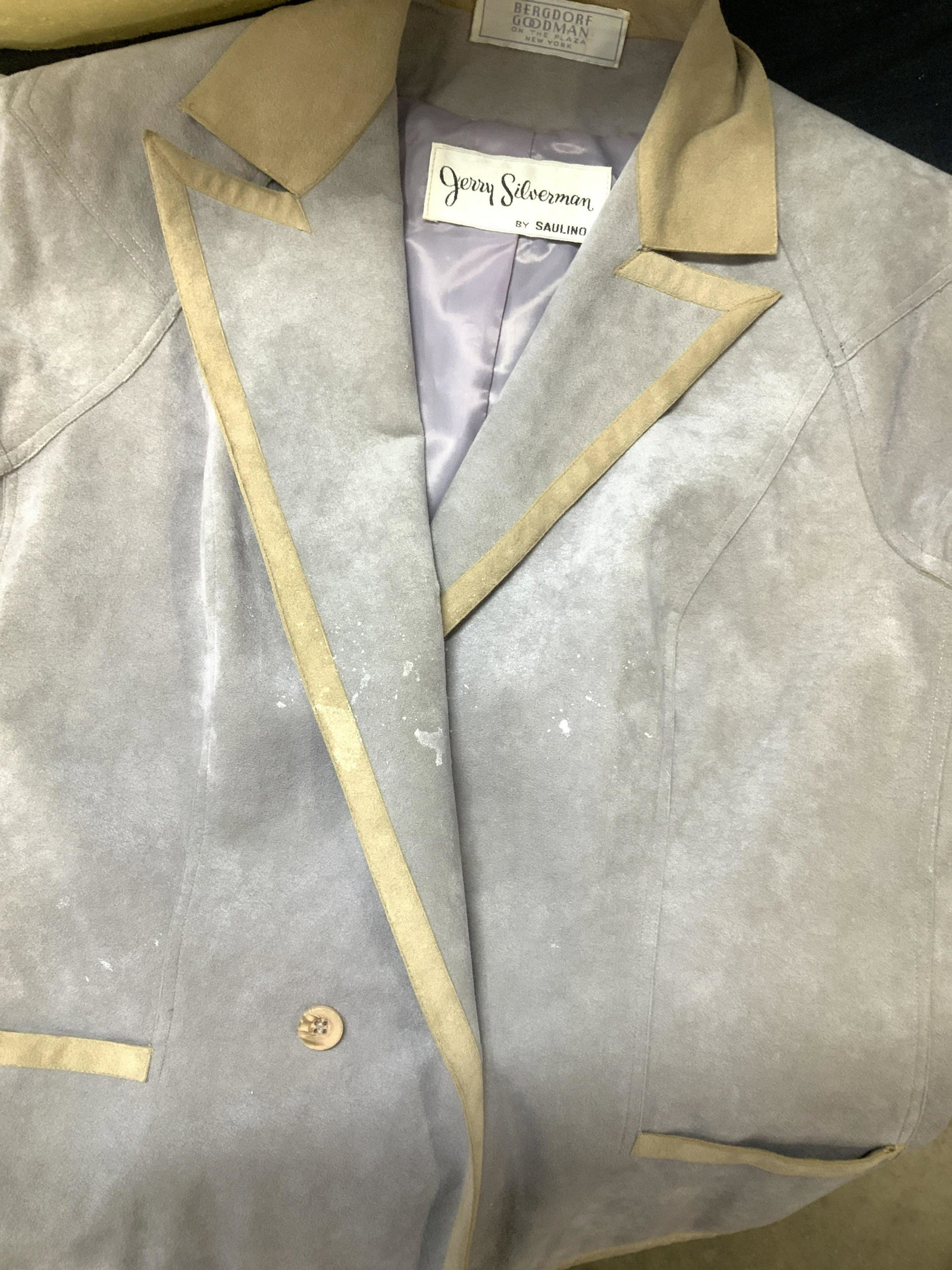 Jerry Silverman by Saulino Vtg Suede Vest: Luxury fashion bought in Bergdorf Goodman, the luxury department store in Manhattan. vest with caps sleeves, Lavender suede with tan suede trim. 38 in. Waist. Short hand pockets. Tuxedo style collar. 