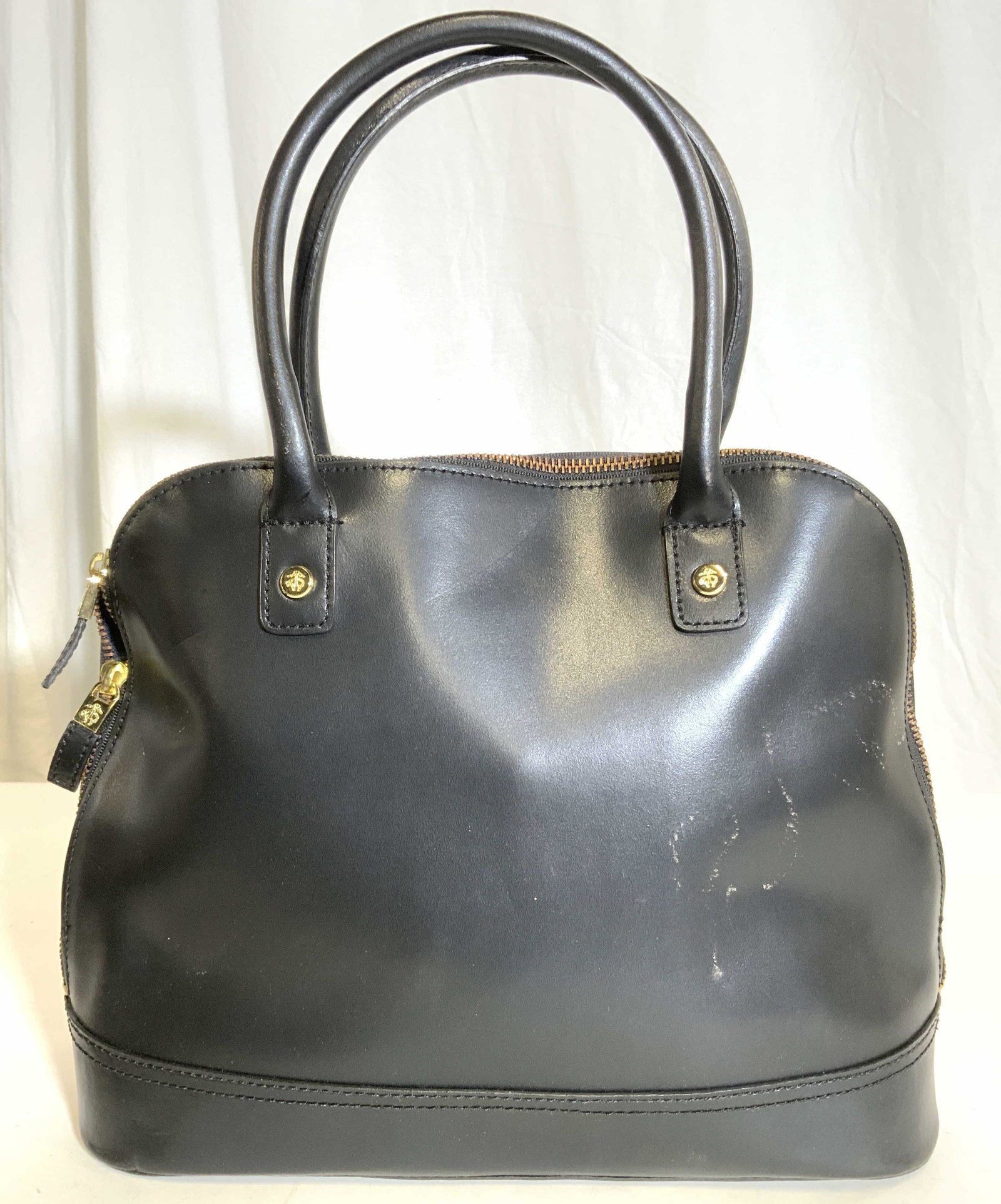 346 BROOKS BROTHERS Leather Purse Hand Bag: Interior has inscriptions which read 346 BROOKS BROTHERS. Piece appears to possibly be leather. Exterior is black, with navy interior. Piece has gold toned hardware. Bag measures approx. 15.5 inches t