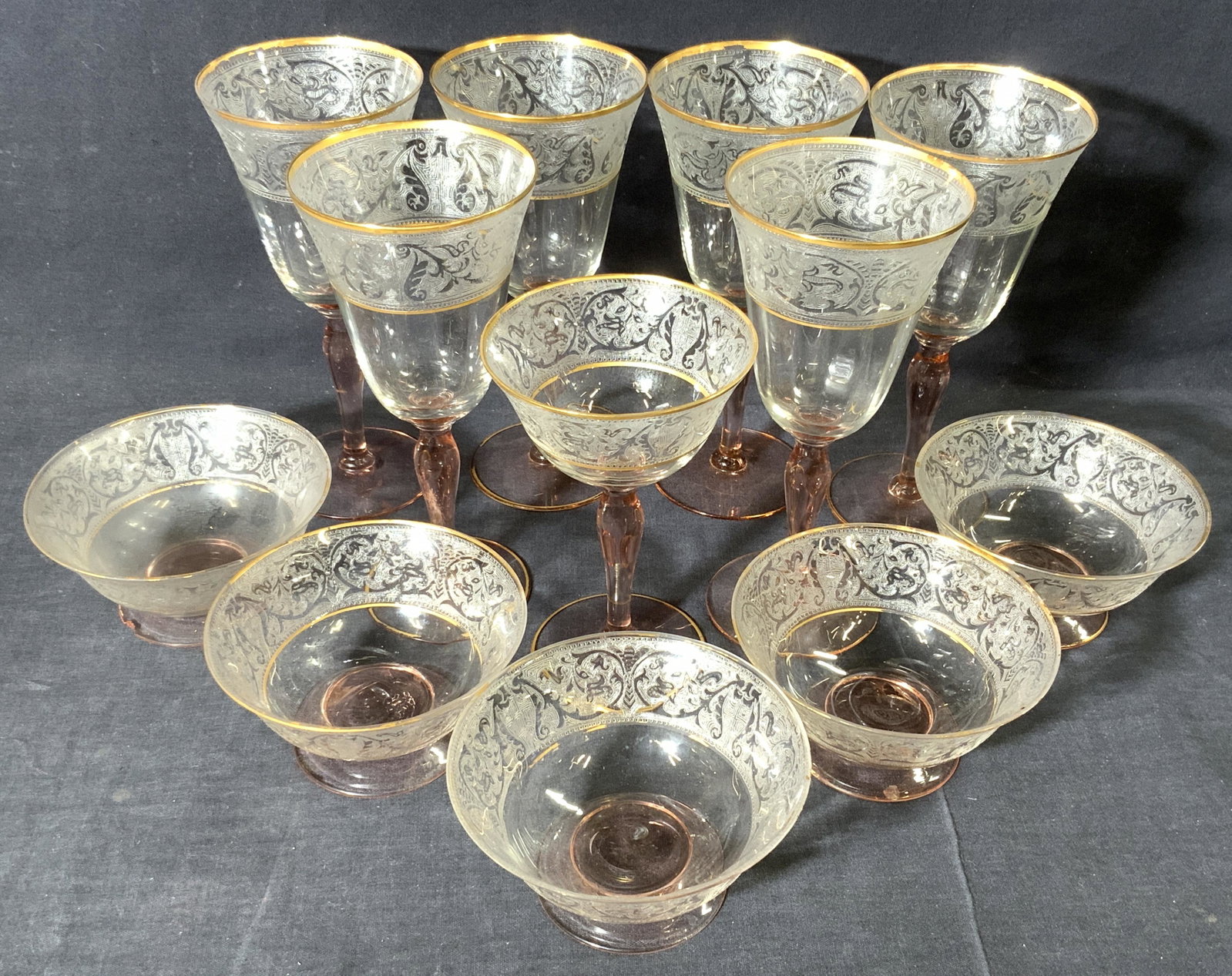 Set of 12 Vintage Glass Dishes & stemware: Vintage Glass Dish & Barware Set of 12, with etching, gilt trim, and pink stems/pedestals, includes 6 wine glasses measuring approx 7 1/2 in. tall and 3 3/8 in. in diameter, 1 champagne/tall sherbet m