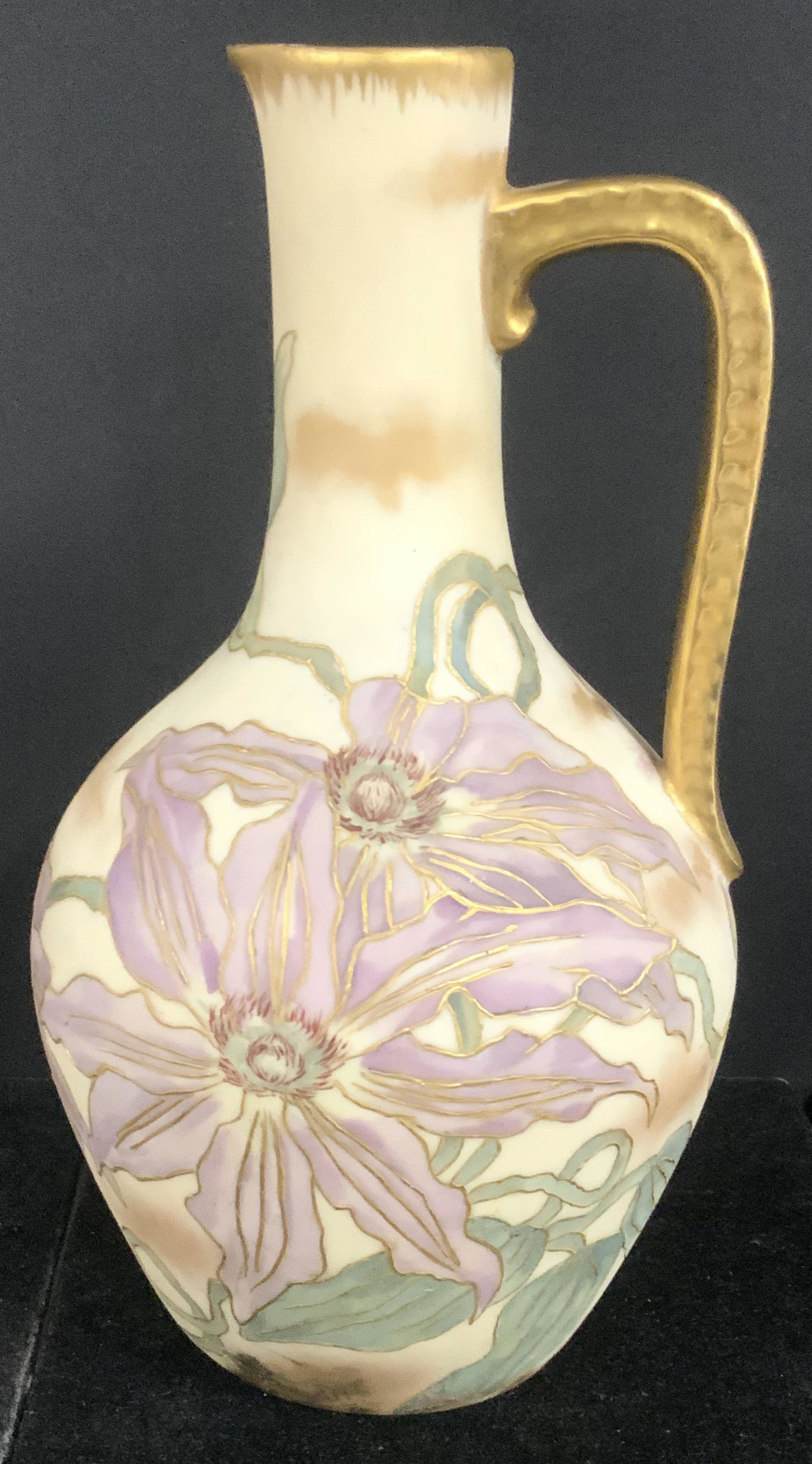 T&V Limoges France Hand Painted Opaline Jug: Antique TRESSEMANN & VOGT Limoges France hand painted off white opaline jug, lavender floral pattern outlined in gilt, solid gilt handle and brushed gilt edge. Hallmarked on verso in green ink under g