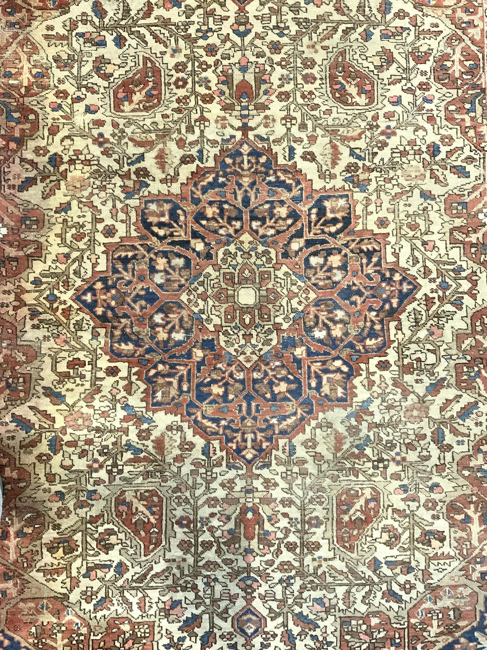 Antique Handmade Persian Wool Area Rug: Rug is handmade and wool. Piece appears to be antique. Rug has intricate multi toned floral, vine, leaf & geometric detail. Rug measures approx 75 inches long 52 inches wide. Rug, carpet, wool rug, ha