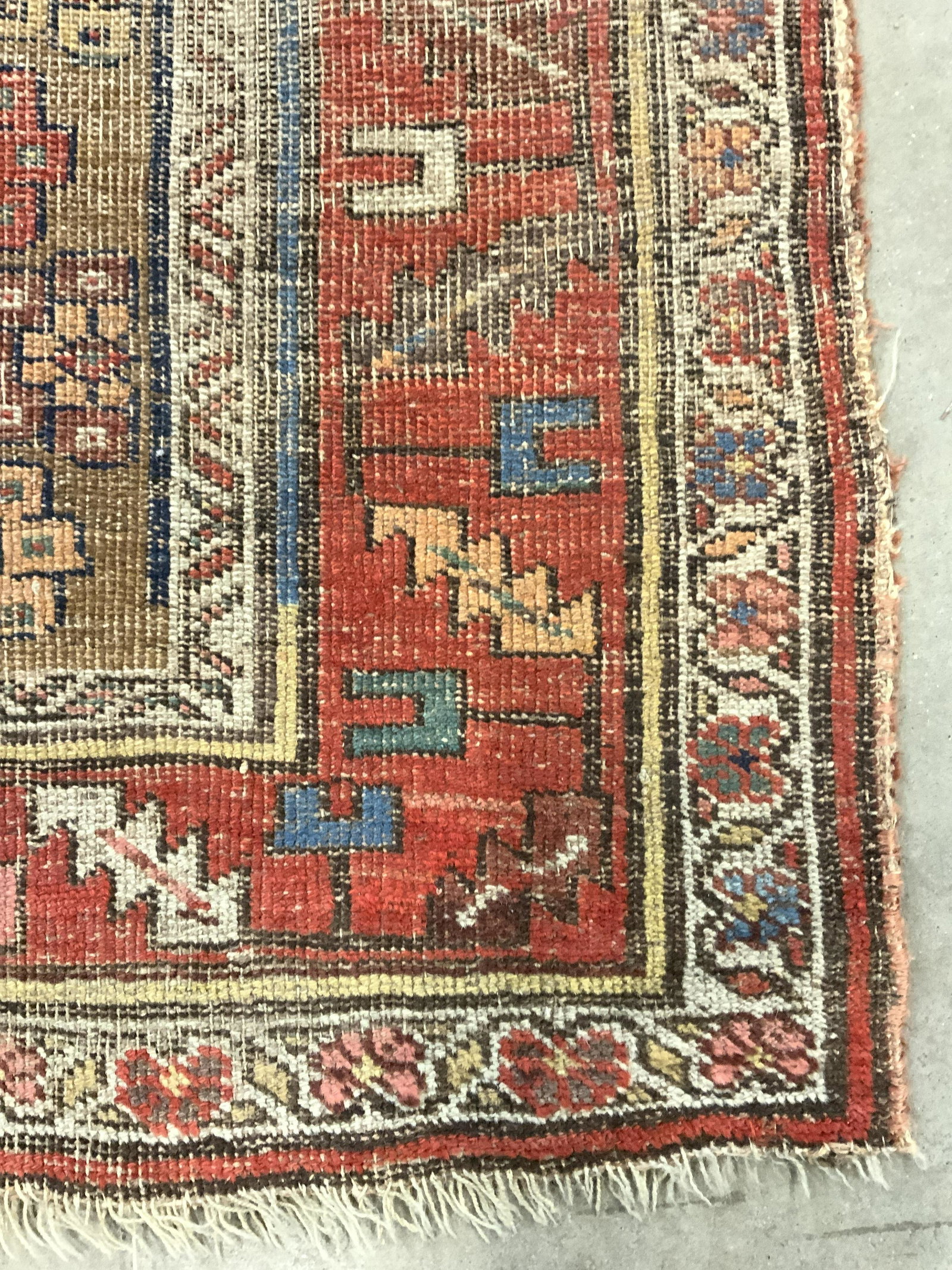 Vintage Handmade Wool Area Rug: Rug is Handmade and wool. Piece appears to be vintage. Rug has intricate multi toned floral & geometric detail. Rug measures approx 67 inches long 44 inches wide. Rug, carpet, wool rug, handmade rug, 