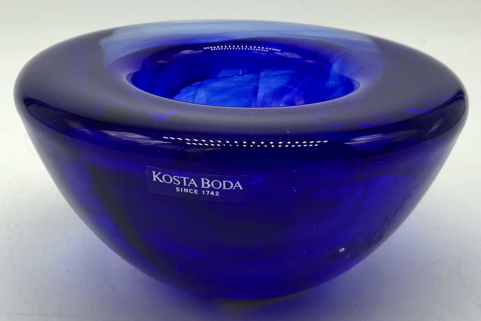 Kosta Boda Royal Blue Crystal Candle Holder: Kosta Boda Royal Blue Crystal Candle Holder by Anna Ehrner, 1990s, measures Height: 2.5 in. (6.35 cm) Diameter: 4.5 in. (11.43 cm), Art glass, art glass crystal, kosta boss, kosta boda royal blue, roy