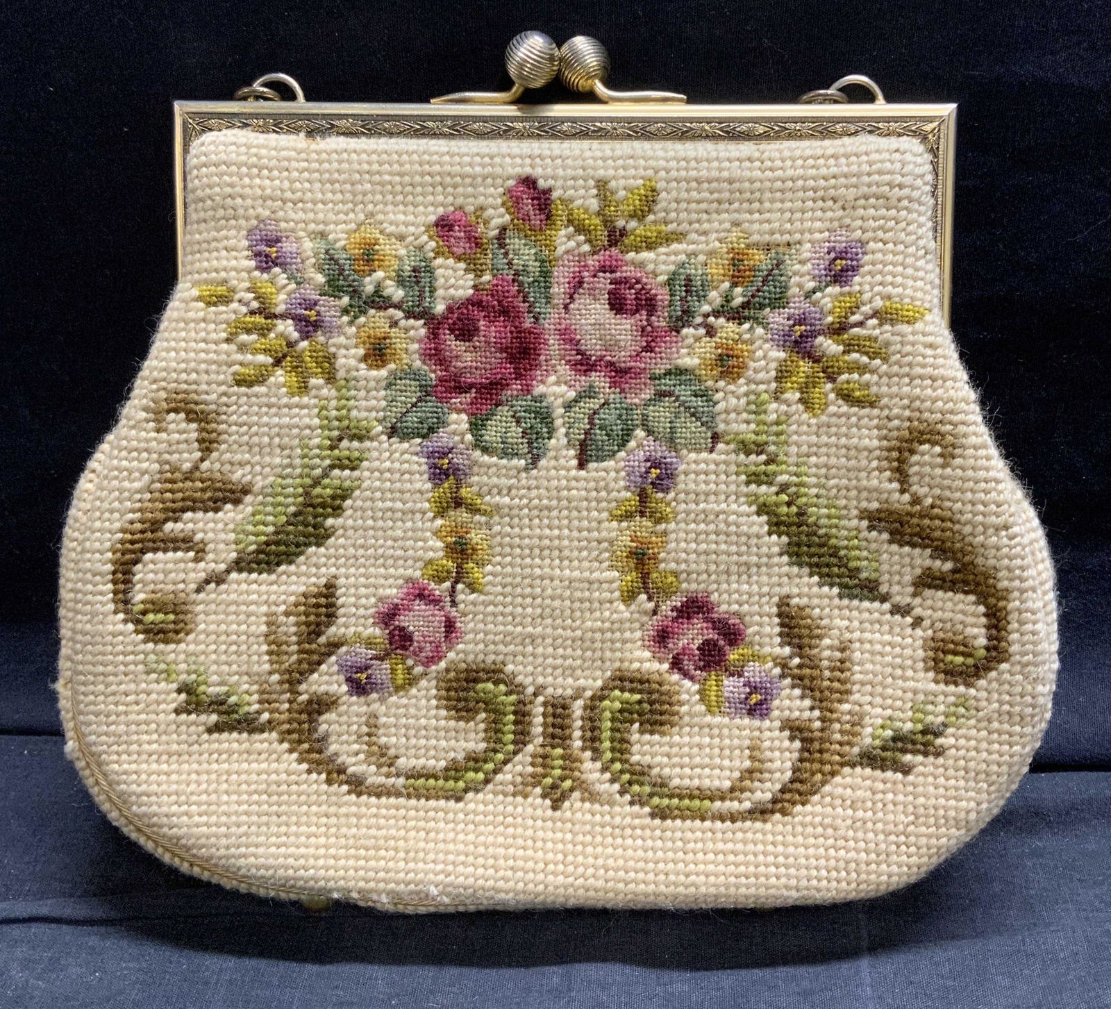 Vintage Needlepoint Bag with Floral Motif: Vintage Needlepoint Bag with Floral Motif, has kiss clasp, measures 10 1/2 x 8 1/2 inches, x 2 1/2 inches width, had handle drop of 7 inches. Bags, hand bag, ladies hand bags, vintage hand bag, vintag