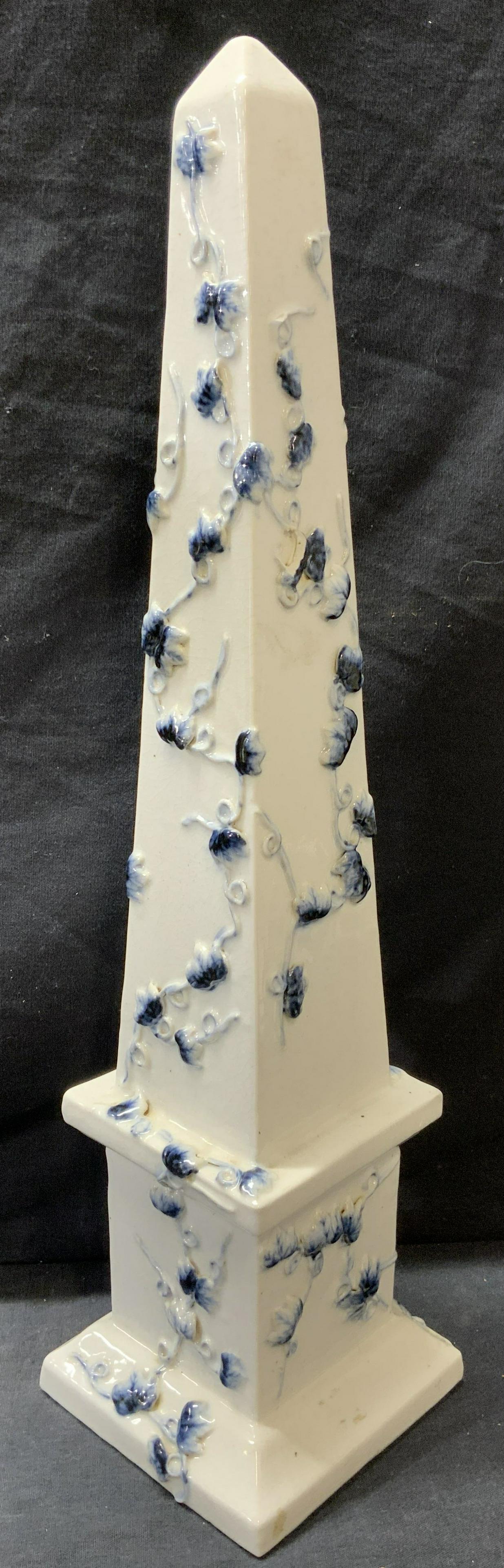 Signed Asian Porcelain Obelisk With Ivy Relief: Signed Asian Porcelain Obelisk With Ivy Relief, Hand painted cobalt blue toned Ivy leaves and vines, verso is signed with Asian characters, surface wear to obelisk, measures approx 18 in. tall x 4 in.