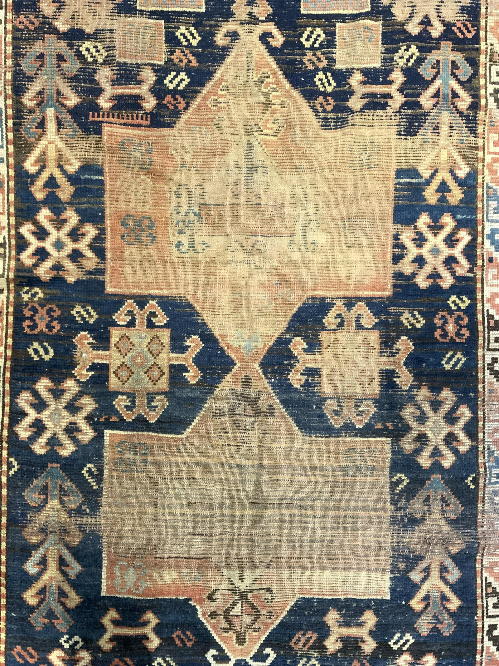 Antique Handmade Turkish Wool Rug: Rug is handmade and wool. Piece appears to be Turkish. Rug is vintage possibly antique. Piece has intricate multi toned geometric detail. Piece measures approx 77 inches long 50 inches wide. Rug, carp