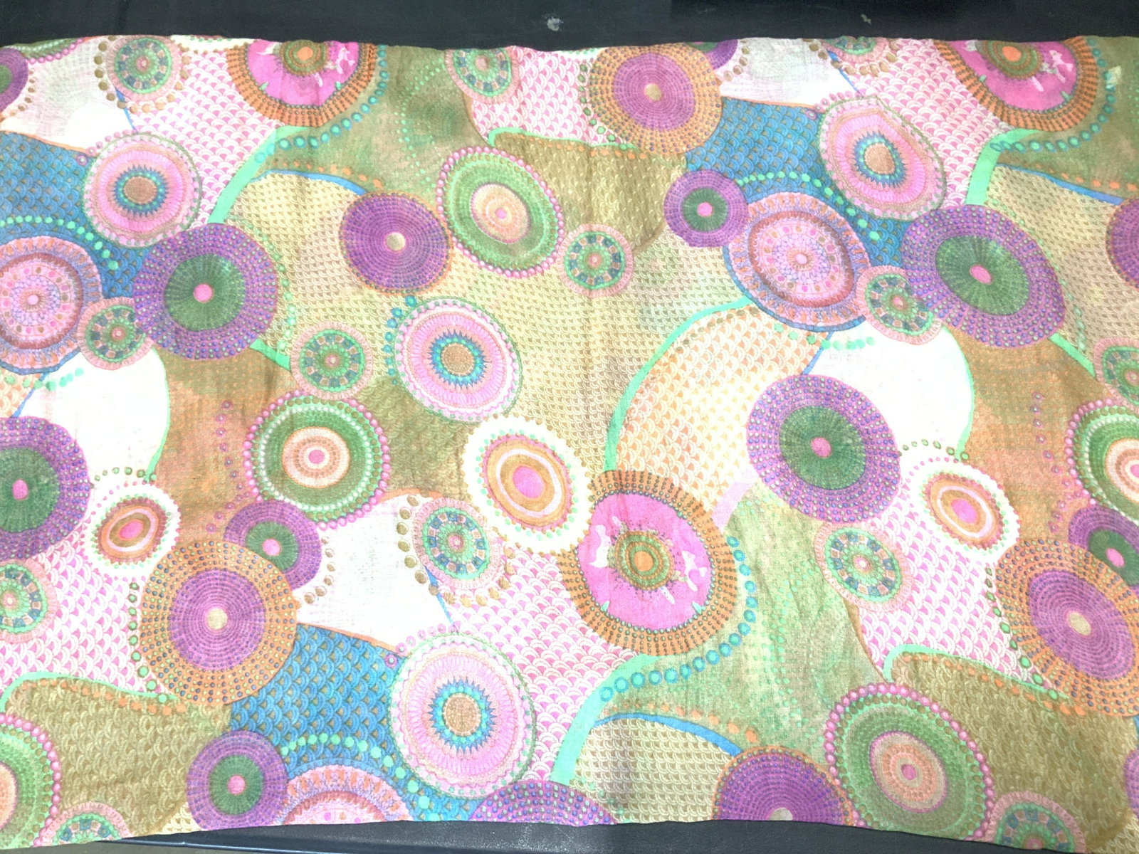 Abstract Pattern Colorful Viscose Fashion Scarf: Scarf/ Wrap. Gauze viscose multi colored mandala pattern with Asian pattern background. Colors of orange, fuchsia, green, aqua and neutral colors. Fabric tags reads 100% viscose. Measures 44 x 68 in. 