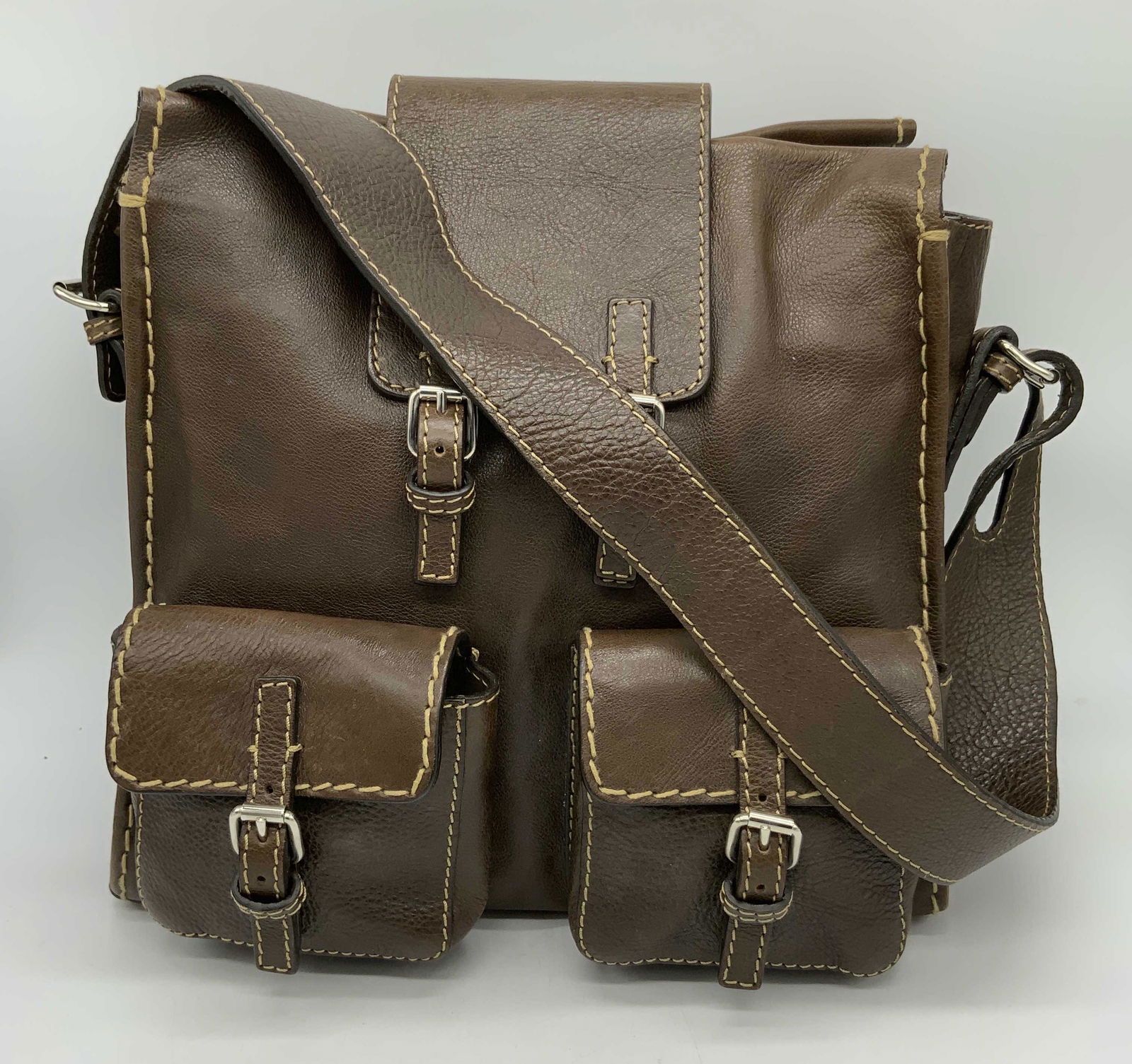 CHLOE Chocolate Leather Satchel, Italy: CHLOE Chocolate Leather Satchel, made in Italy, silver toned hardware, adjustable leather shoulder strap, two exterior flap pockets with buckle closure, top closure is a magnetic snap with leather fla