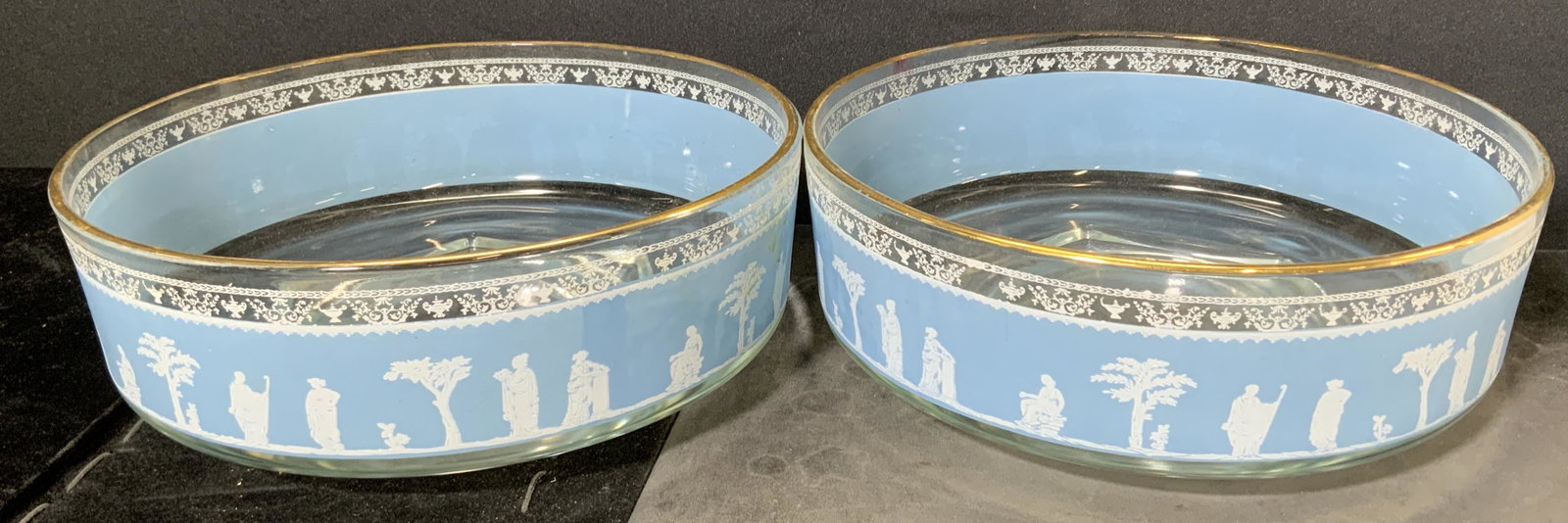 JEANETTE GLASS CO. Lot 2 Bowls: Lot 2 JEANETTE GLASS CO. bowls. Gilt Rims, Jasperware print, Greco Roman style, depicts several robed figures. Scratches, surface wear, residue present. Measures approx 3.25 inches h, 9 inches w. Jasp