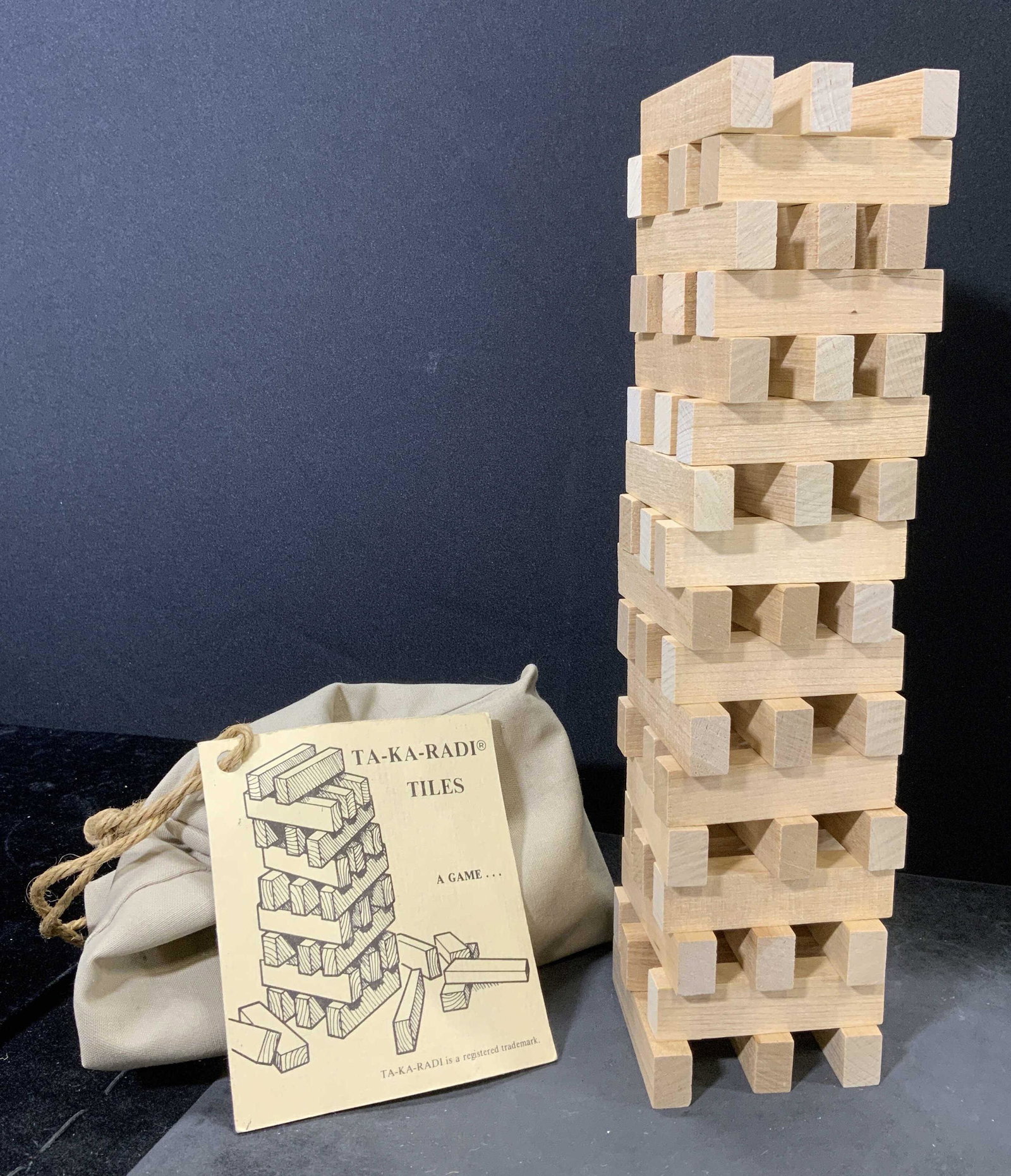 LL BEAN TA-KA-RADI Tile Game: Includes 50 wooden tiles, and 1 draw string bag. Instruction affixed to bag. Wear to bag and instructions. Largest piece measures approx 8 inches x 8 inches. Home decor, decorative accessories, decora
