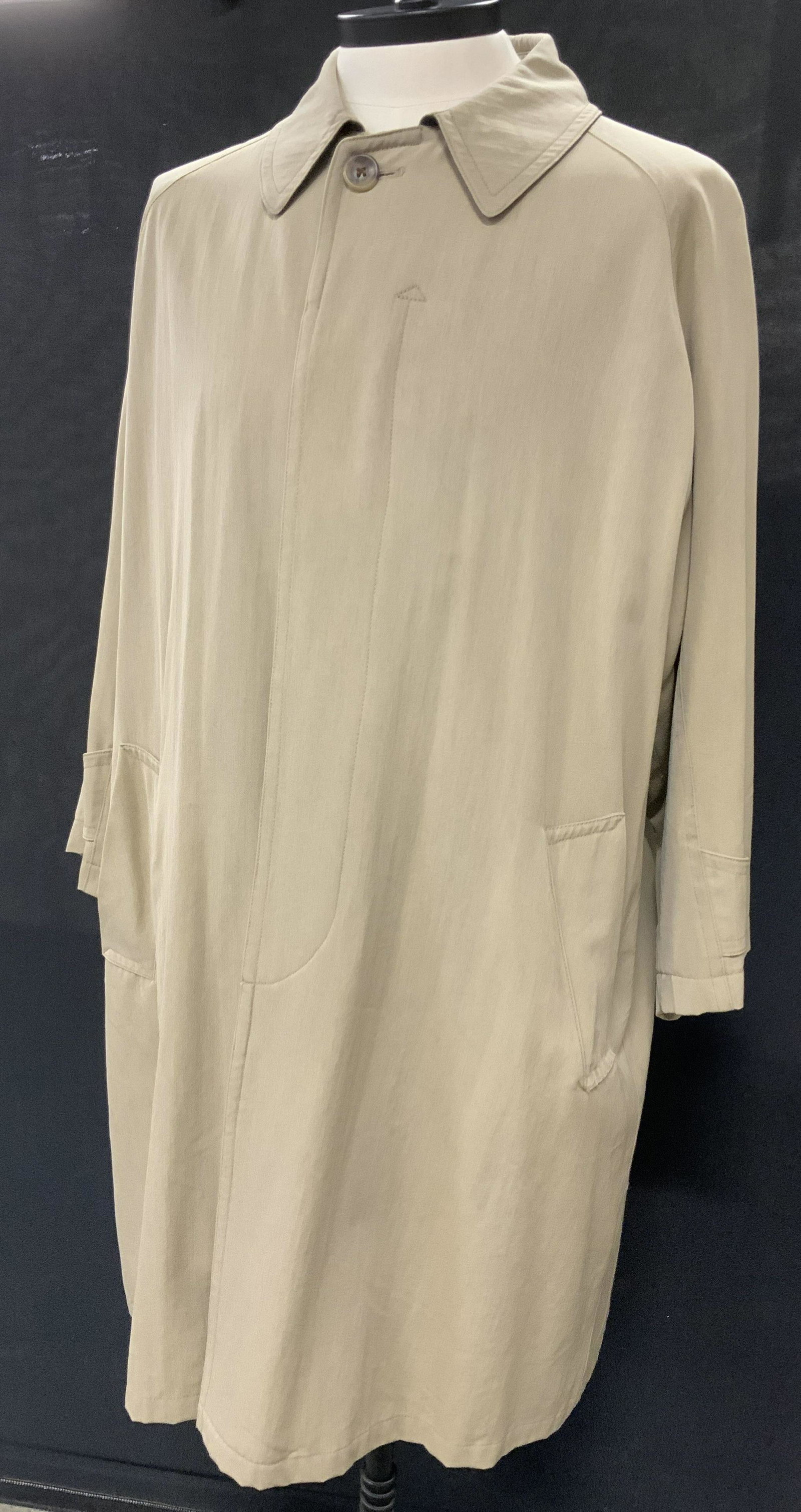 DRIZZLE vintage Khaki Trench Coat: DRIZZLE Khaki Trench Coat, made of imported fabric, measures. Likely polyester shelling, Approx 42 inches in length, waist has a total length of 54 inches around, sleeves measure 30 inches from collar