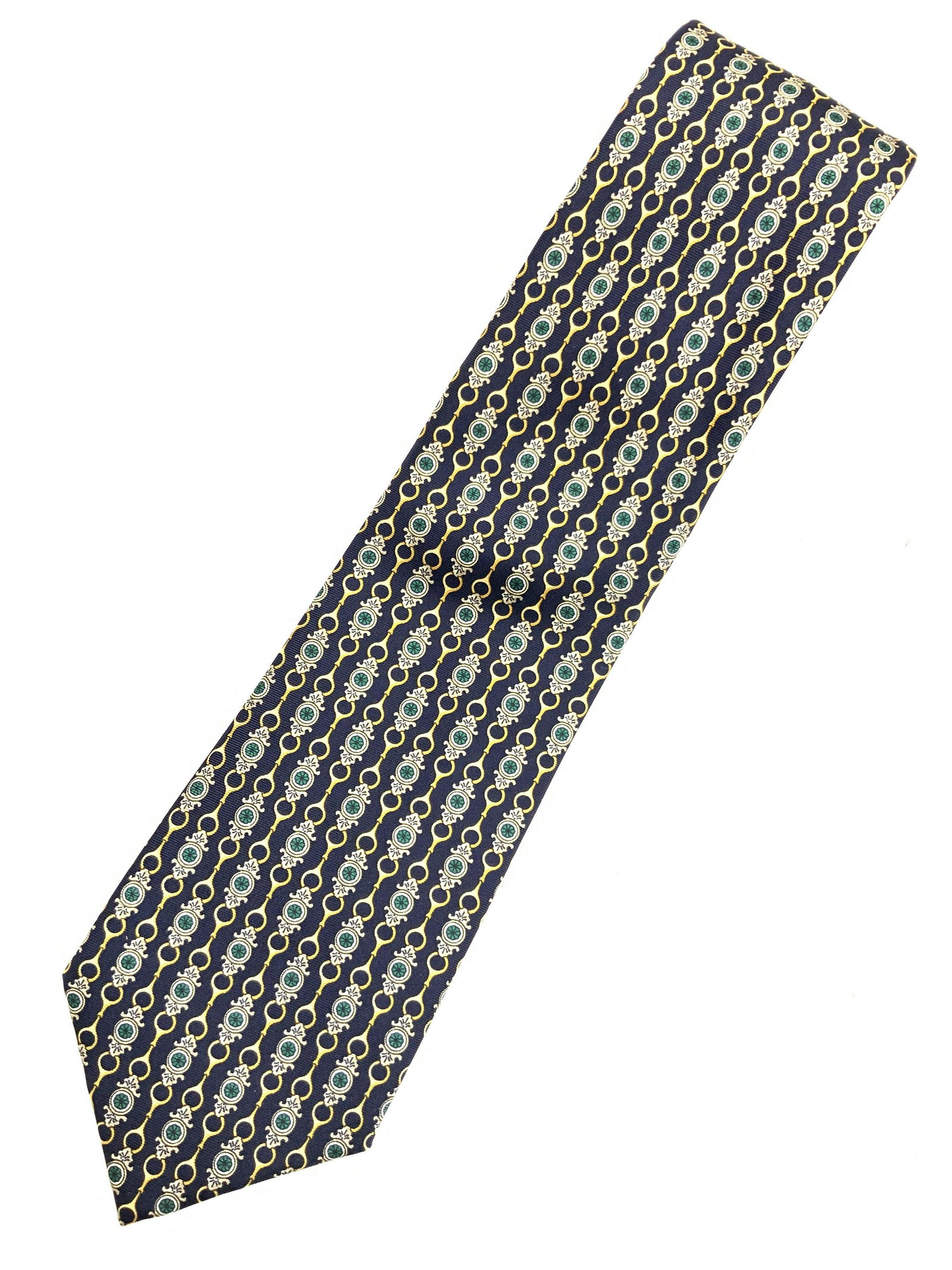BURBERRYS 100% Silk Tie: Silk tie, with tag that reads Burberrys, and material tag that’s marked All Silk. Tie is a Royal blue tone with gold threaded chain like depictions throughout the scarf. Approximately 60 inches long