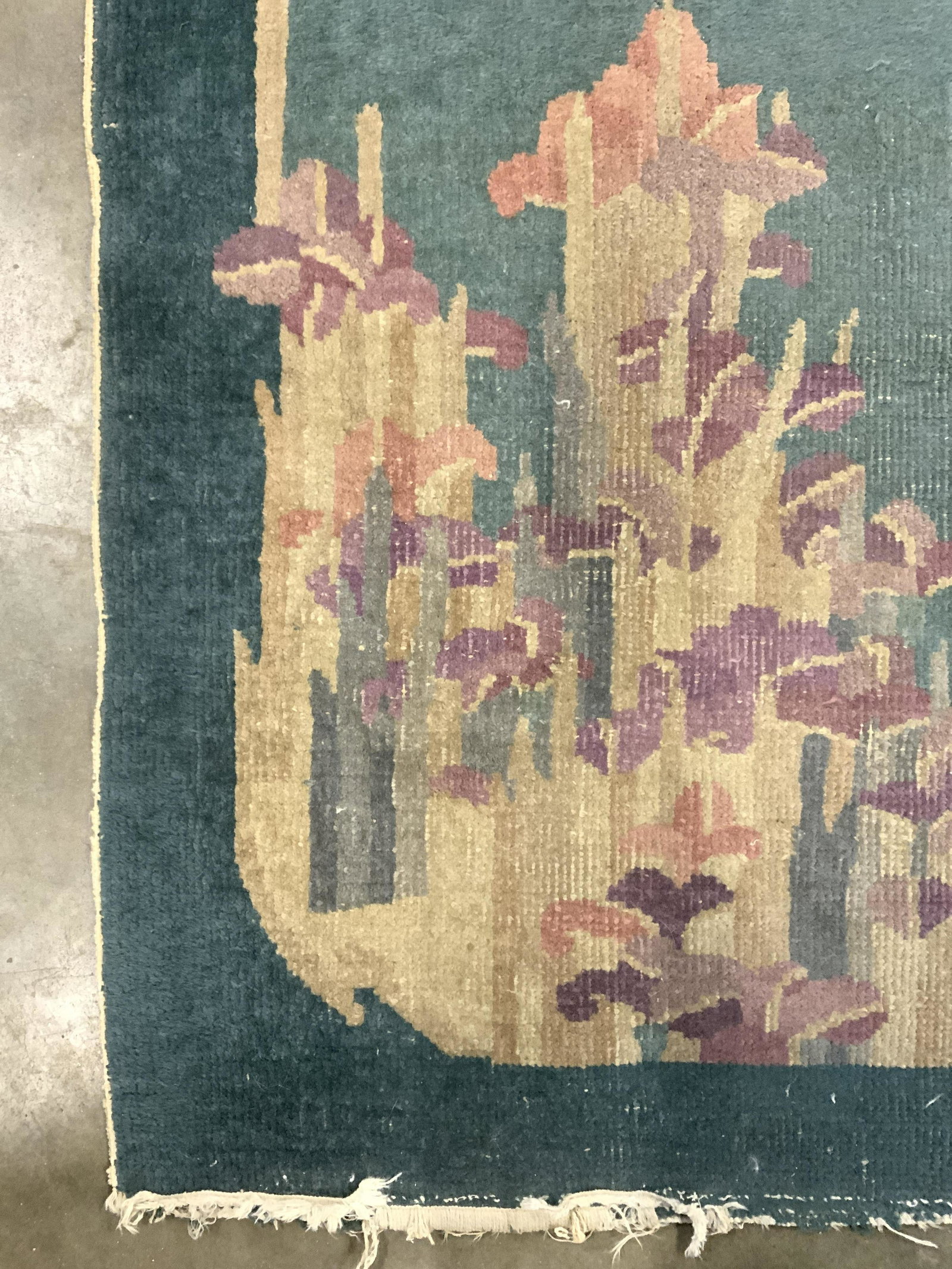 Vintage Handmade Chinese Art Deco Wool Rug: Rug is handmade and wool. Piece has intricate multi toned floral & leaf detail. Rug is vintage possibly antique. Piece measures approx 70 inches long 36 inches wide. Rug, vintage rug, wool rug, handma