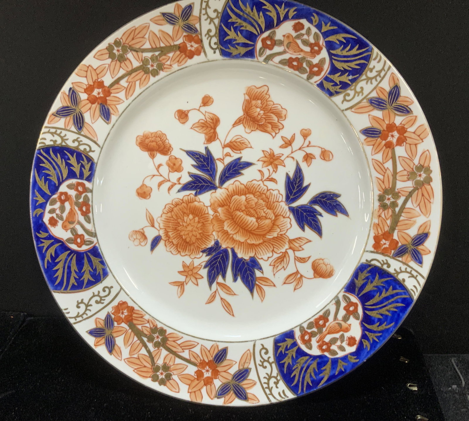 Hand painted Vintage IMARI Porcelain Plate: White porcelain hand painted with blue, orange and gilt floral and cartouch designs. No hallmarks. Plate measures 10.5 in. Porcelain ware, asian Imari porcelain with flowers, hand painted, dinner plat