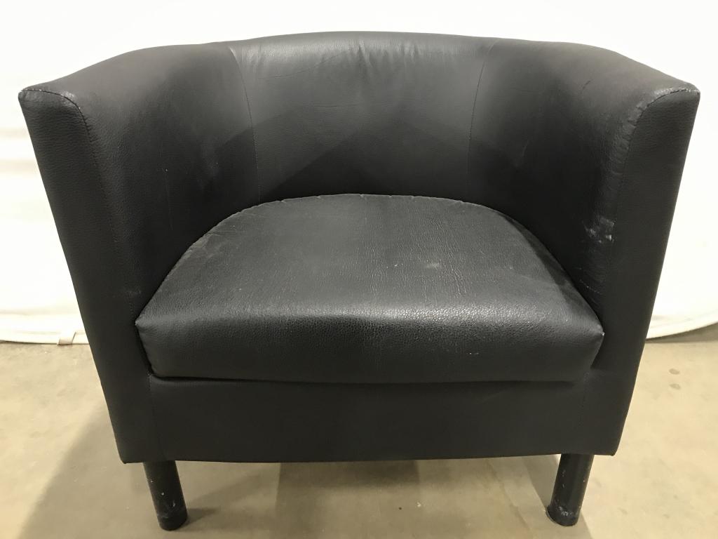 Black Toned Faux Leather Barrel Arm Chair May 04, 2022 The Benefit
