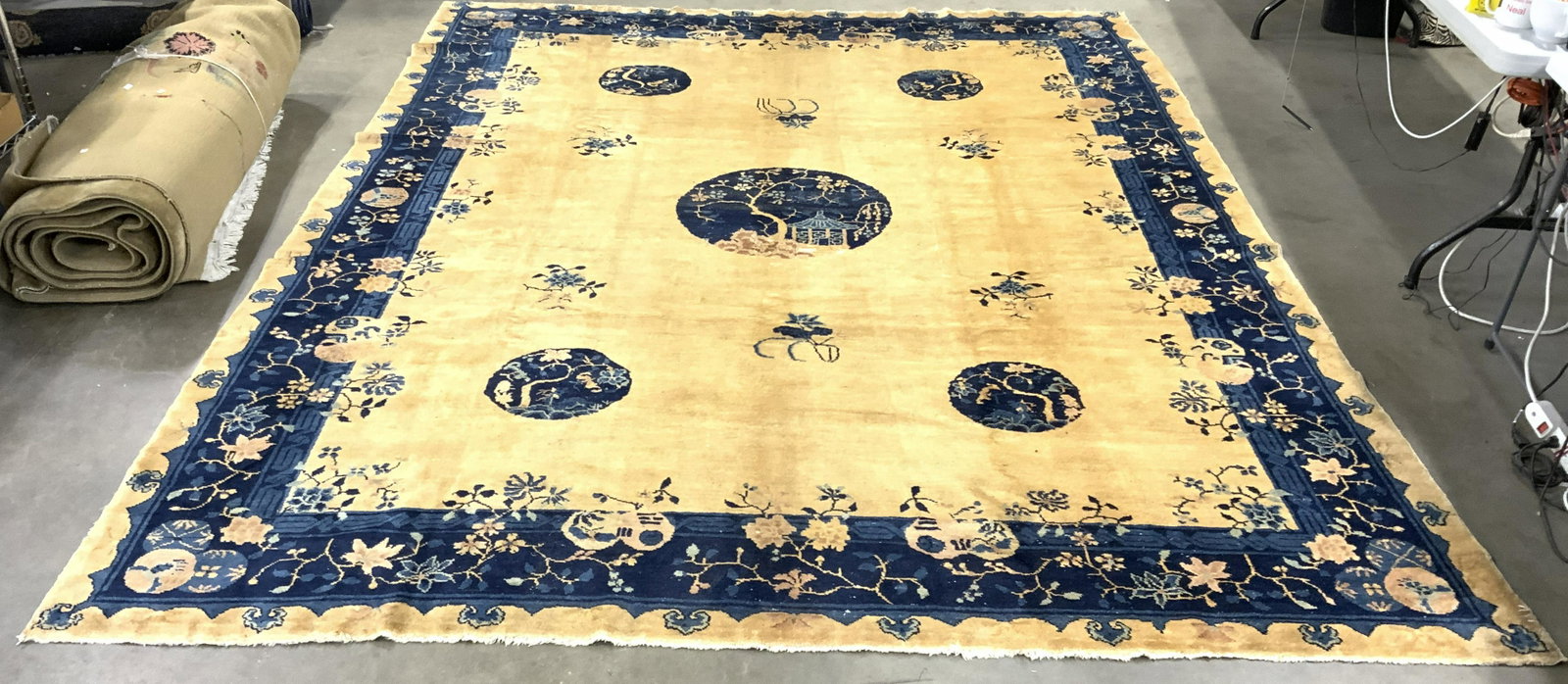 Vtg Room Sz Handmade Chinese Art Deco Wool Rug: Rug is handmade, appears to be wool possibly silk. Rug is room sized. Piece is vintage possibly antique. Rug has blue sand and beige toned geometric, floral, vine and leaf detail. Rug measures approx 