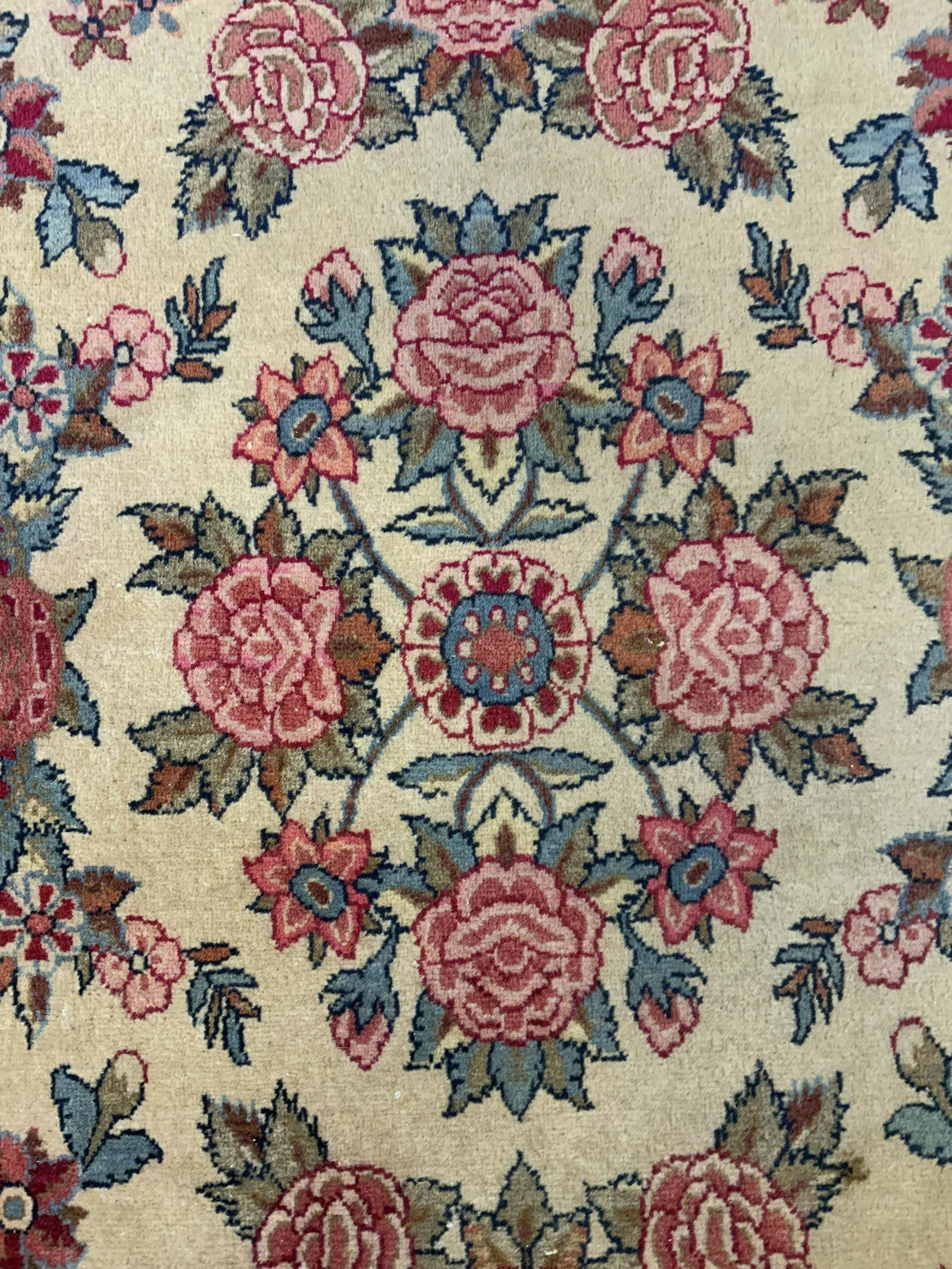 Vintage Art Nouveau Style Area Rug: Vintage Art Nouveau area rug. Multi toned floral and scrolling patterns. Ends are fringed, fringes heavily worn. Wear is consistent with age and use, surface wear present, needs cleaning. Measures app