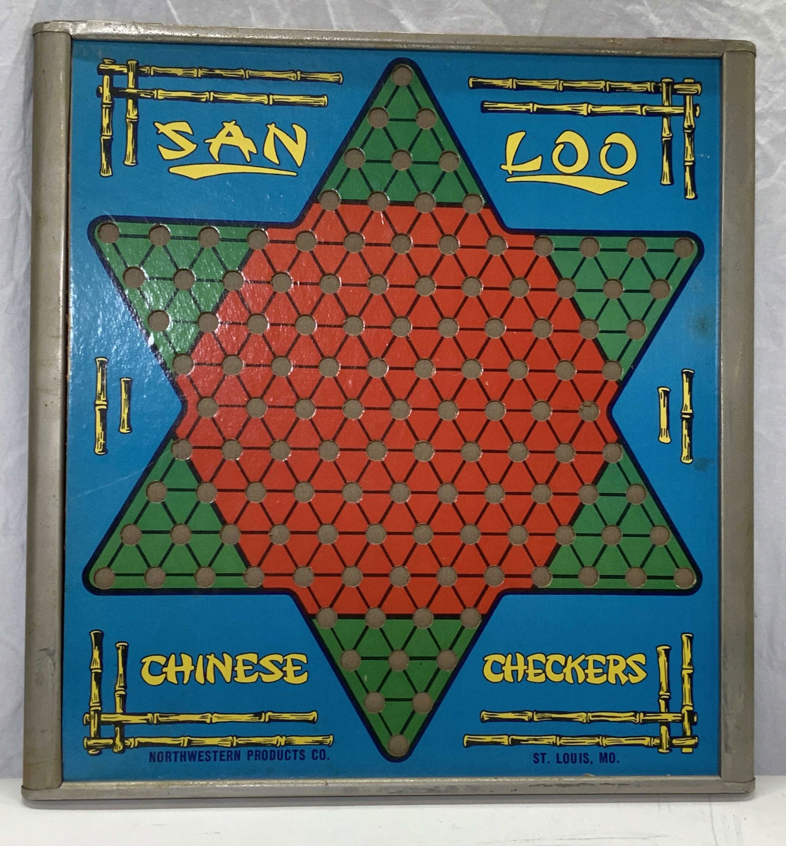 Vintage Chinese Checkers and Checker Board: San Loo mid century Chinese Checkers board encased in white metal with marble storage along sides. signed Northwestern Prod. Co St. Louis MO. Marbles not examined but easily replaced if missing colors